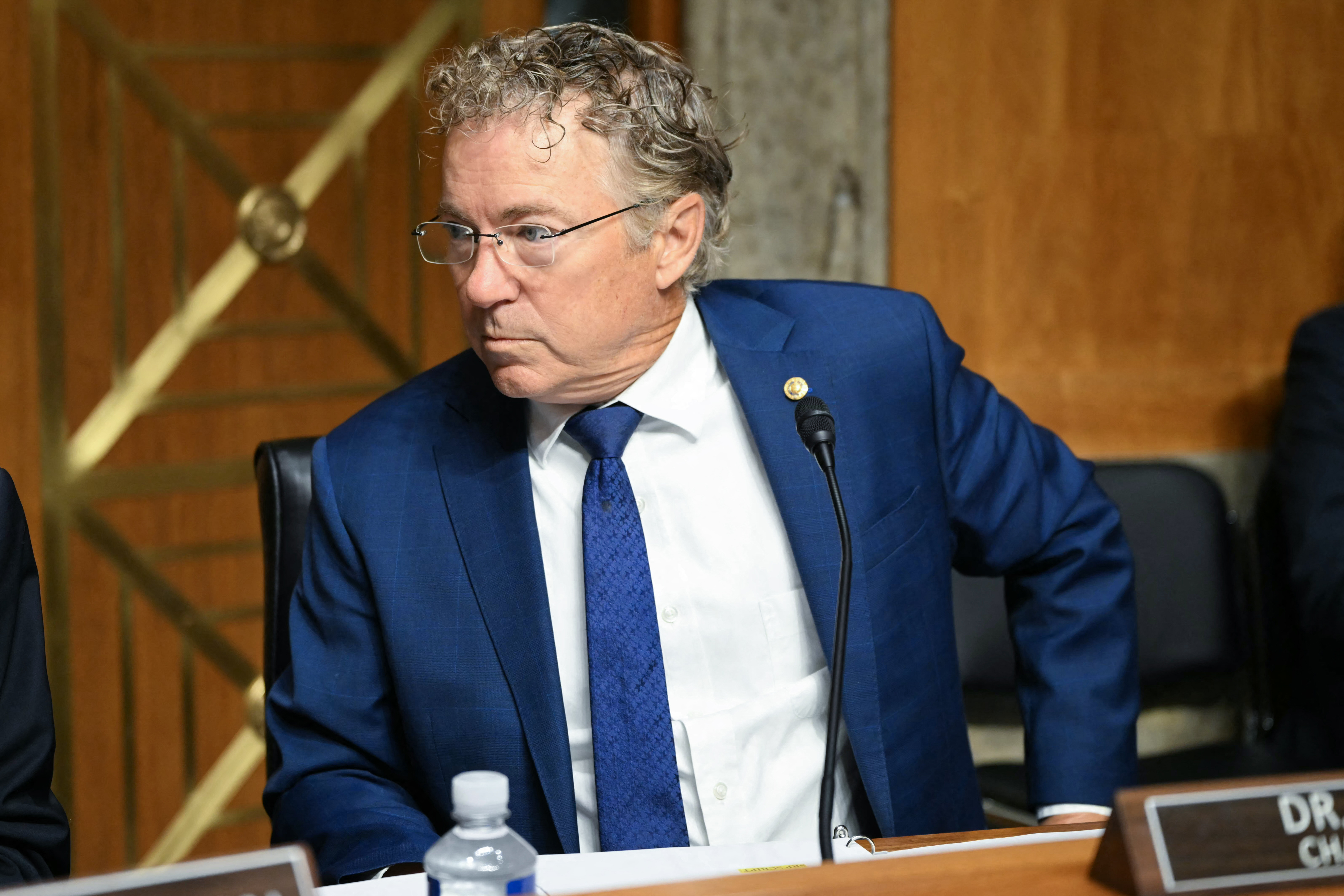 Committee chairman Senator Rand Paul, Reublican from Kentucky, takes his seat as he arrives for a Senate Homeland Security and Governmental Affairs committee hearing with Dr. Anthony Fauci on Capitol Hill in Washington, DC, on July 29, 2026.