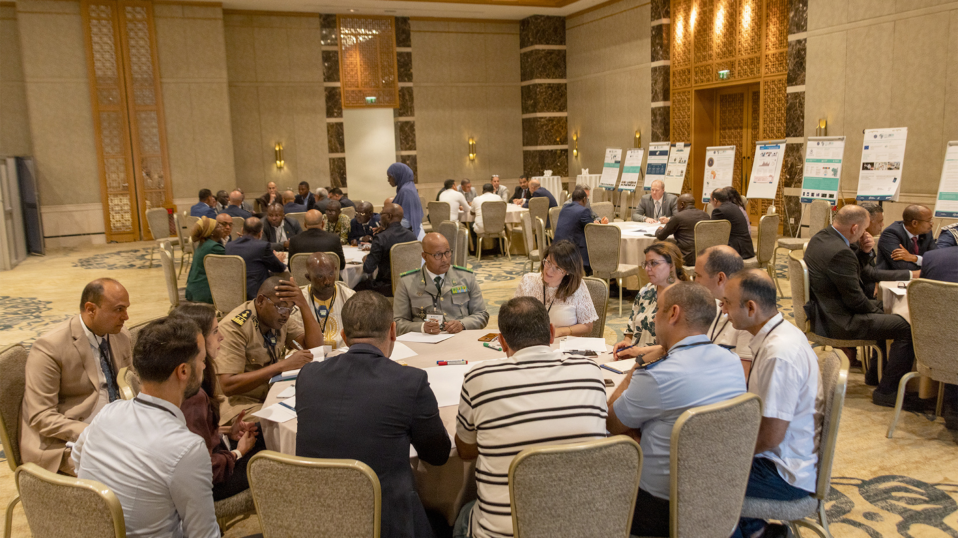 Law enforcement, military and policy officials participate in discussions during the Africa Shield 2026 workshop in Tunis [Handout/Andrea Chaney/Defense Threat Reduction Agency]
