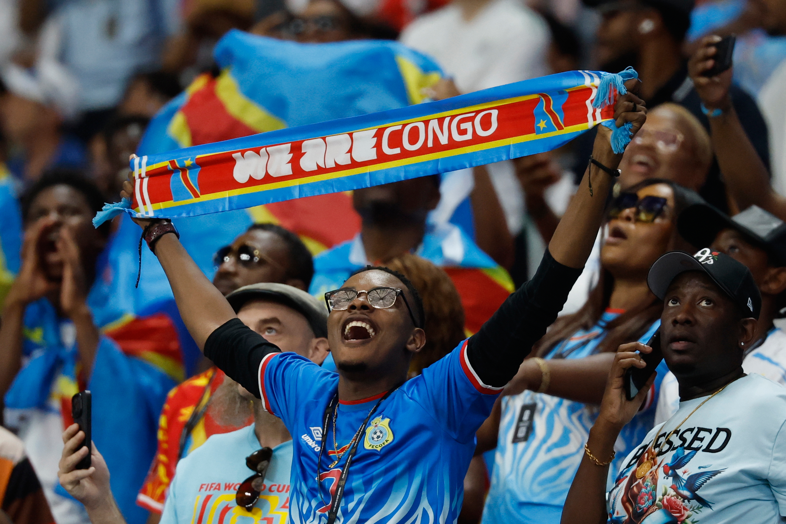A fan from Congo waits for the start of the World Cup round of 32 soccer match between England and Congo in Atlanta, Wednesday, July 1, 2026 [Erik S.Lesser/AP]