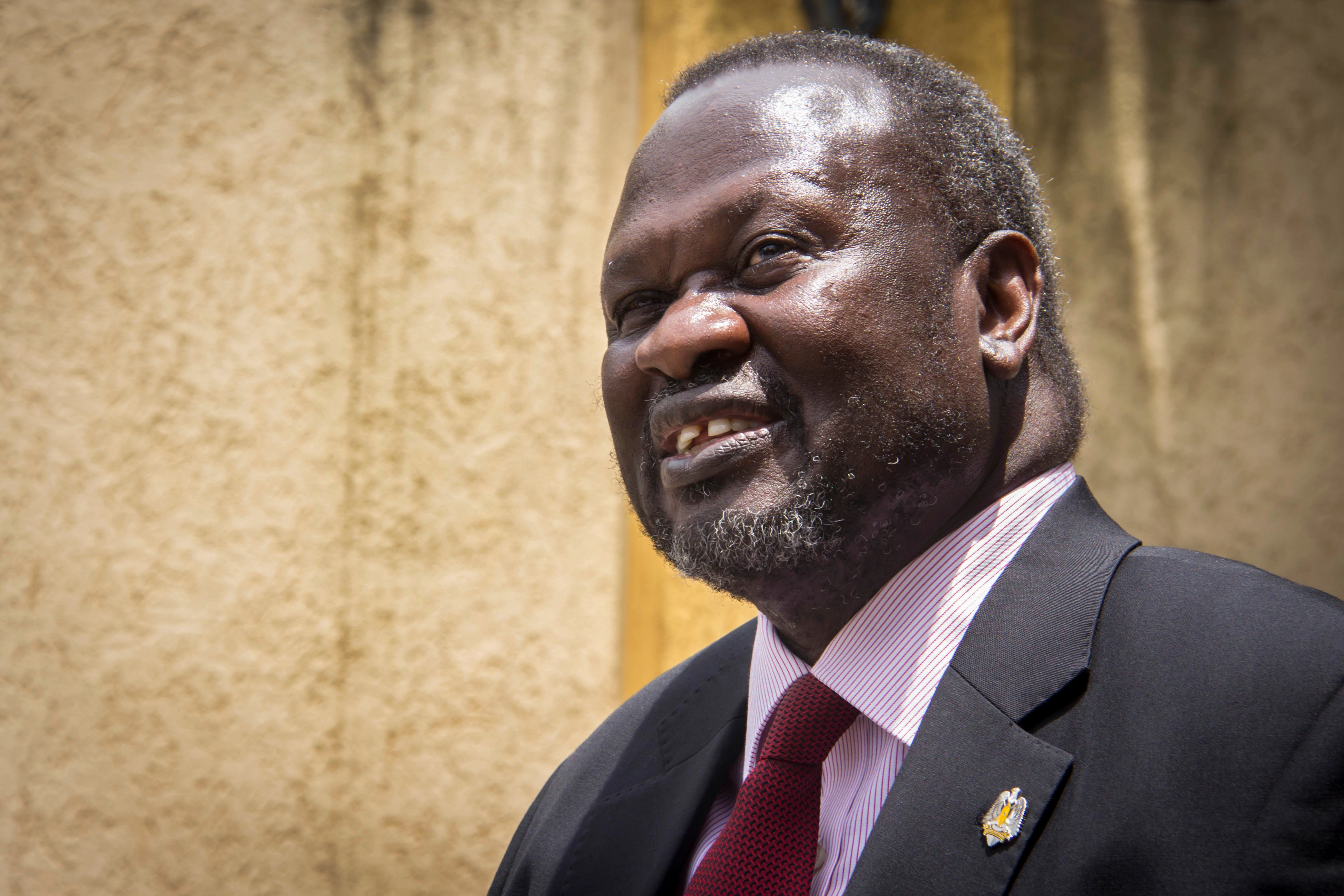 FILE - South Sudan's rebel leader Riek Machar speaks to the media about the situation in South Sudan following a peace agreement the week before with the government in Addis Ababa, Ethiopia, Aug. 31, 2015. (AP Photo/Mulugeta Ayene, File)