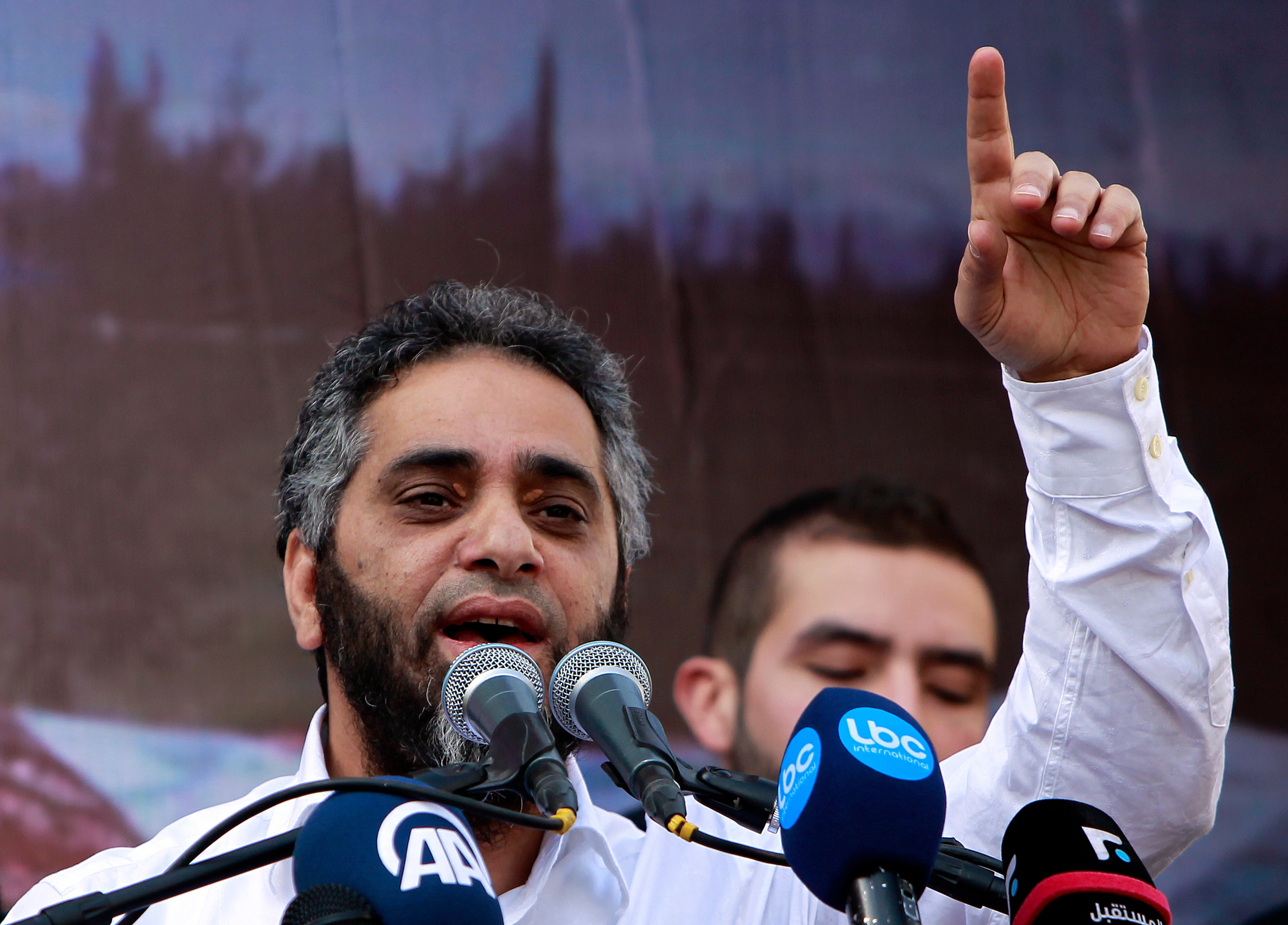 FILE - Lebanese pop idol Fadel Shaker delivers a sermon in support of Syrian rebel fighters and Syrian refugees after the Friday prayer, Feb. 8, 2013, in Beirut. (AP Photo/Bilal Hussein, File)