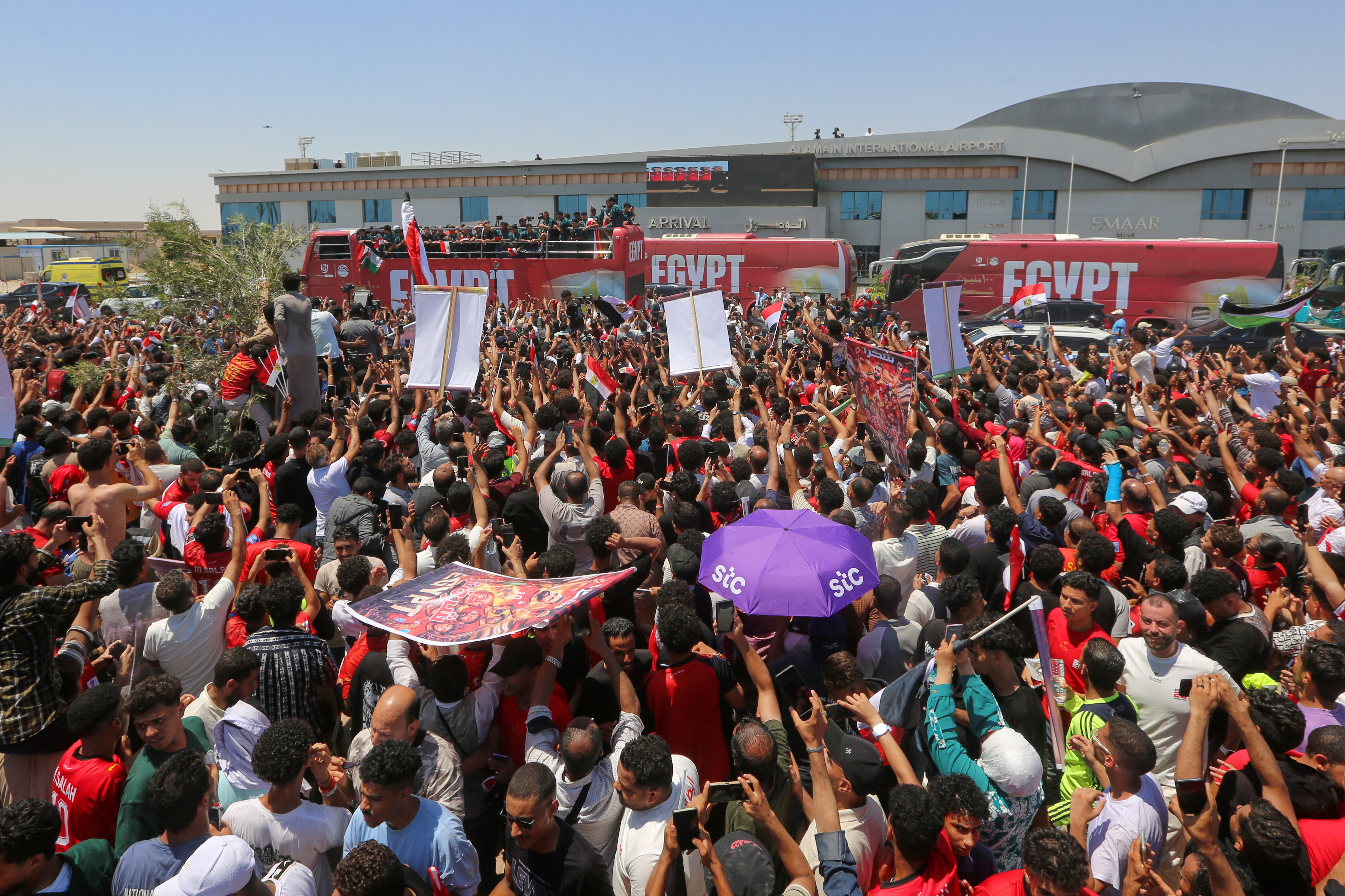 Fans crowd to greet the Egyptian national soccer team during their arrival at El-Alamein airport, 160 km (99 miles) west of Alexandria, Egypt, Friday, July 10, 2026. (AP Photo)