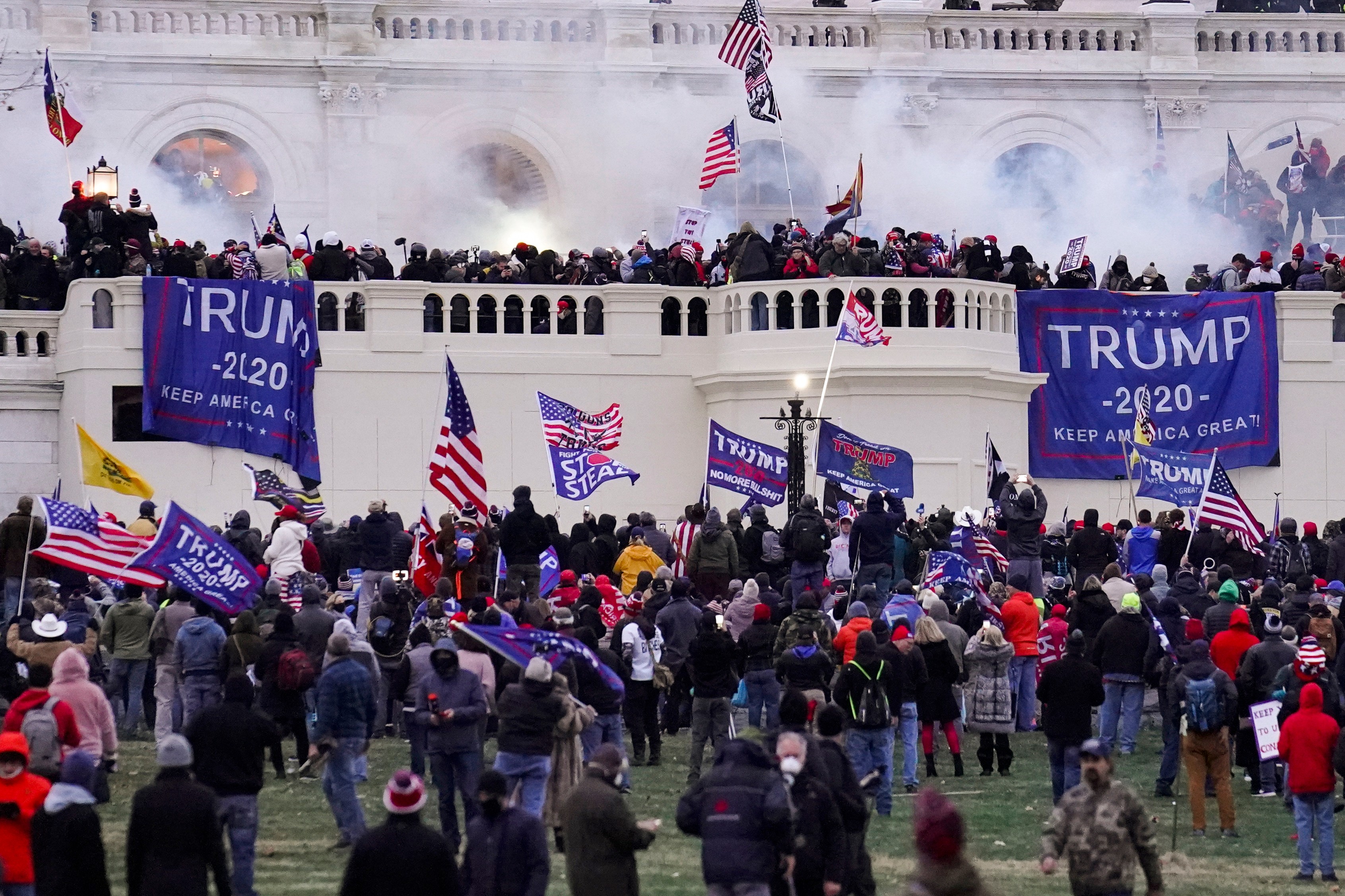 FILE - Rioters supporting President Donald Trump storm the Capitol in Washington, Jan. 6, 2021. (AP Photo/John Minchillo, File)
