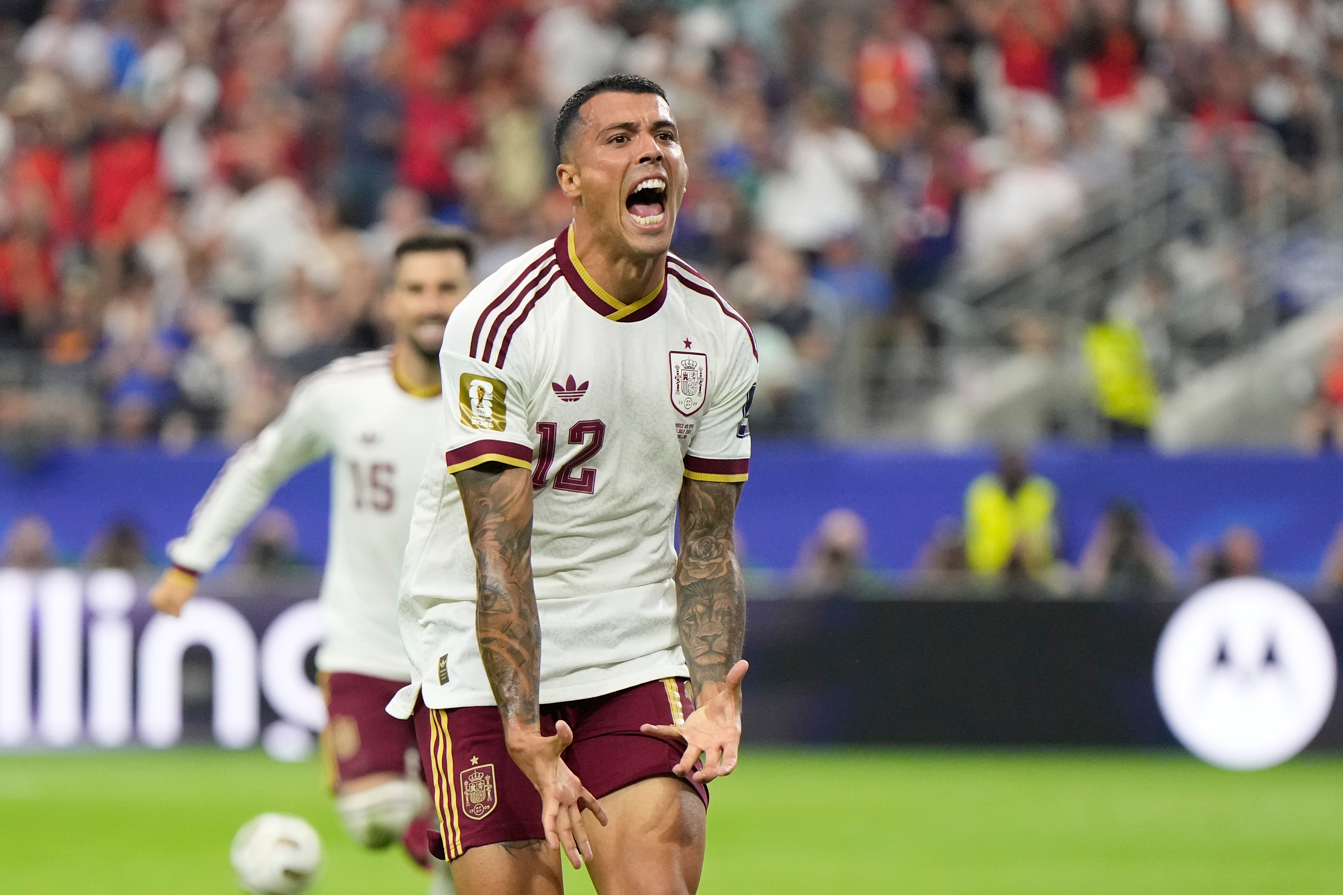 Spain's Pedro Porro reacts after scoring his side's second goal during the World Cup semifinal soccer match between France and Spain in Arlington, Texas, near Dallas, Monday, July 14, 2026. (AP Photo/Ashley Landis)