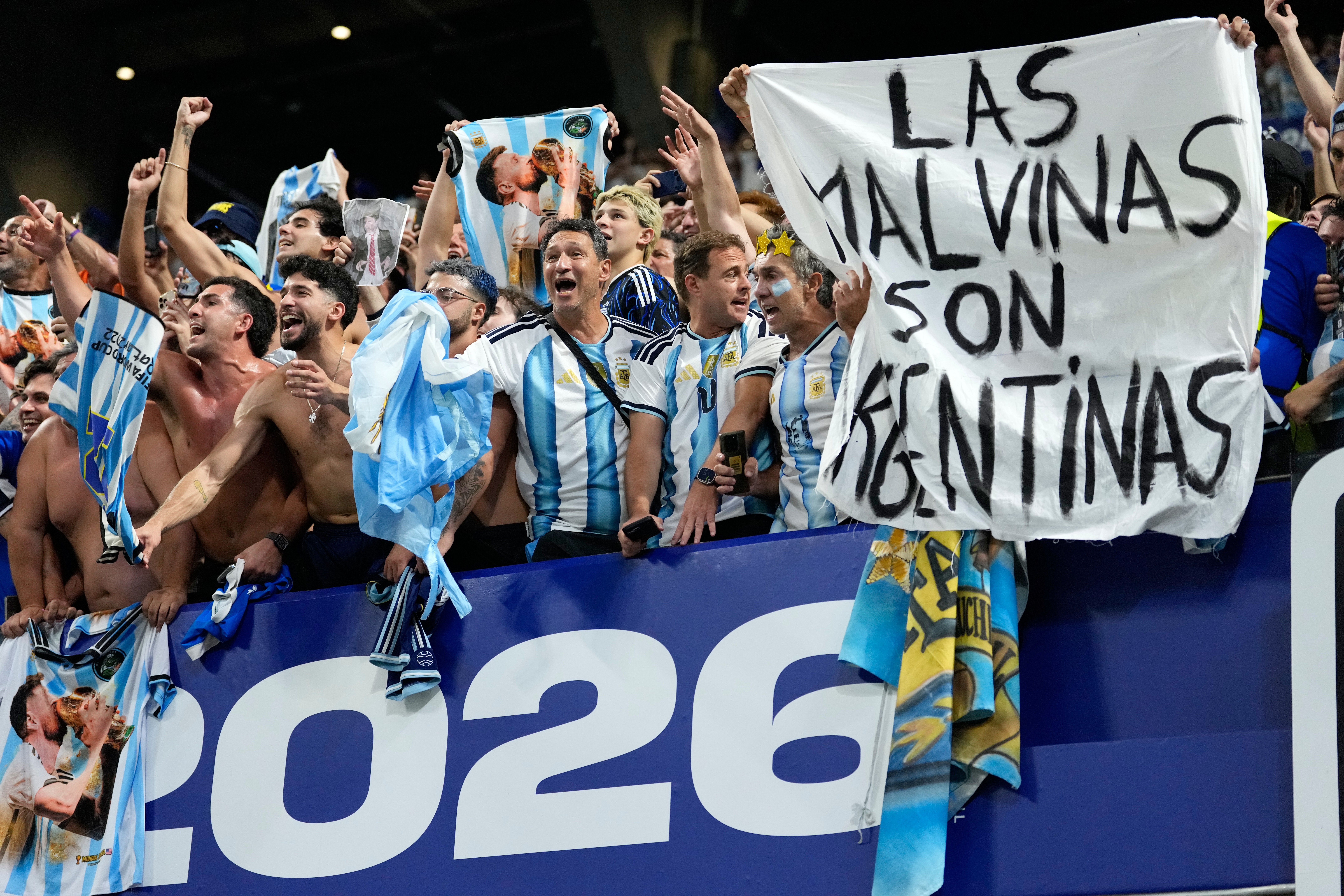 Argentina fans hold a banner with the words "The Malvinas are Argentinian", referring to the Falkland Islands, at the end of the World Cup semifinal soccer match between England and Argentina in Atlanta, Wednesday, July 15, 2026. (AP Photo/Rebecca Blackwell)