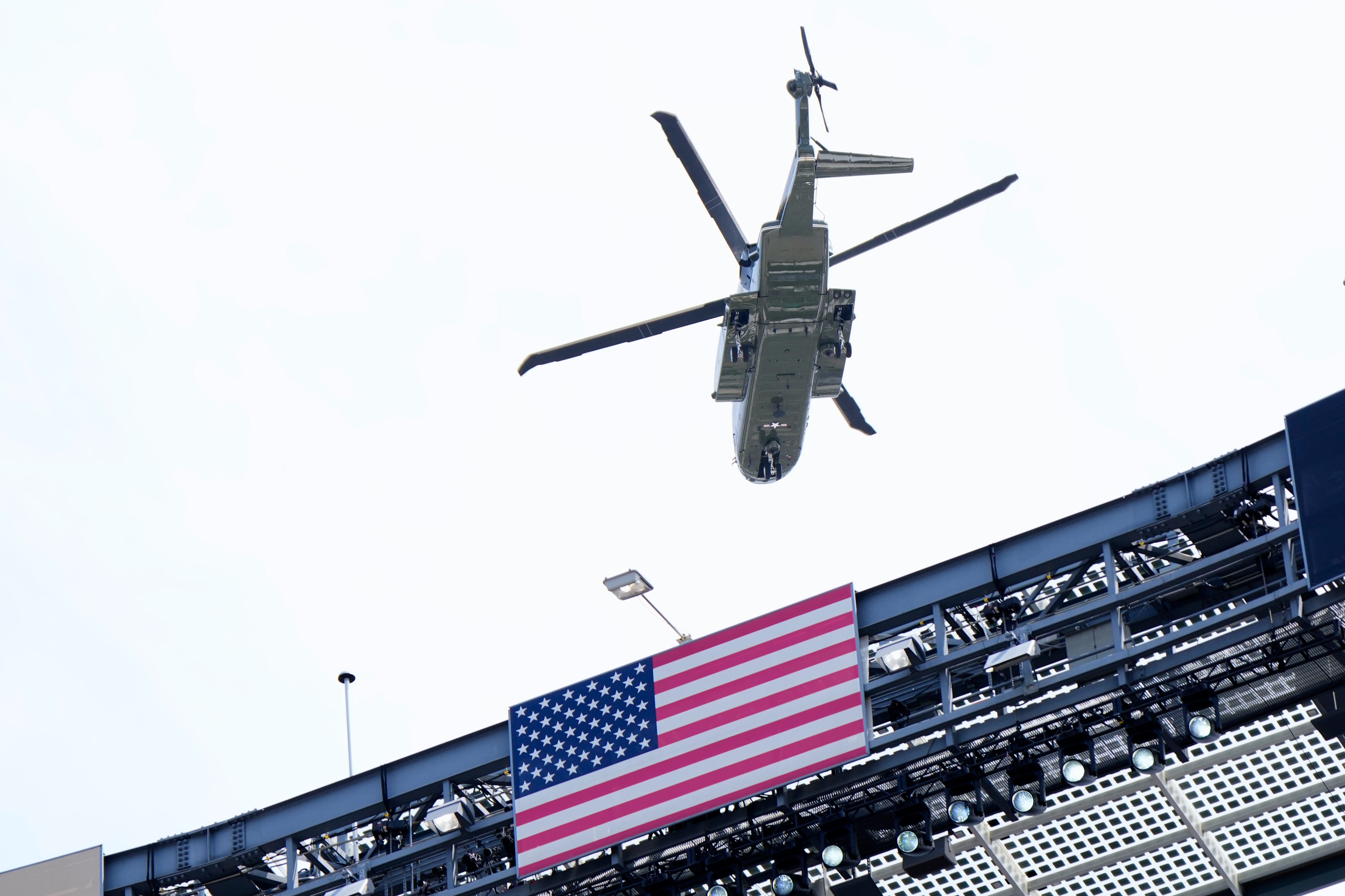 A presidential helicopter flies over the stadium before the World Cup final soccer match between Spain and Argentina in East Rutherford, N.J., near New York, Sunday, July 19, 2026. (AP Photo/Ashley Landis)
