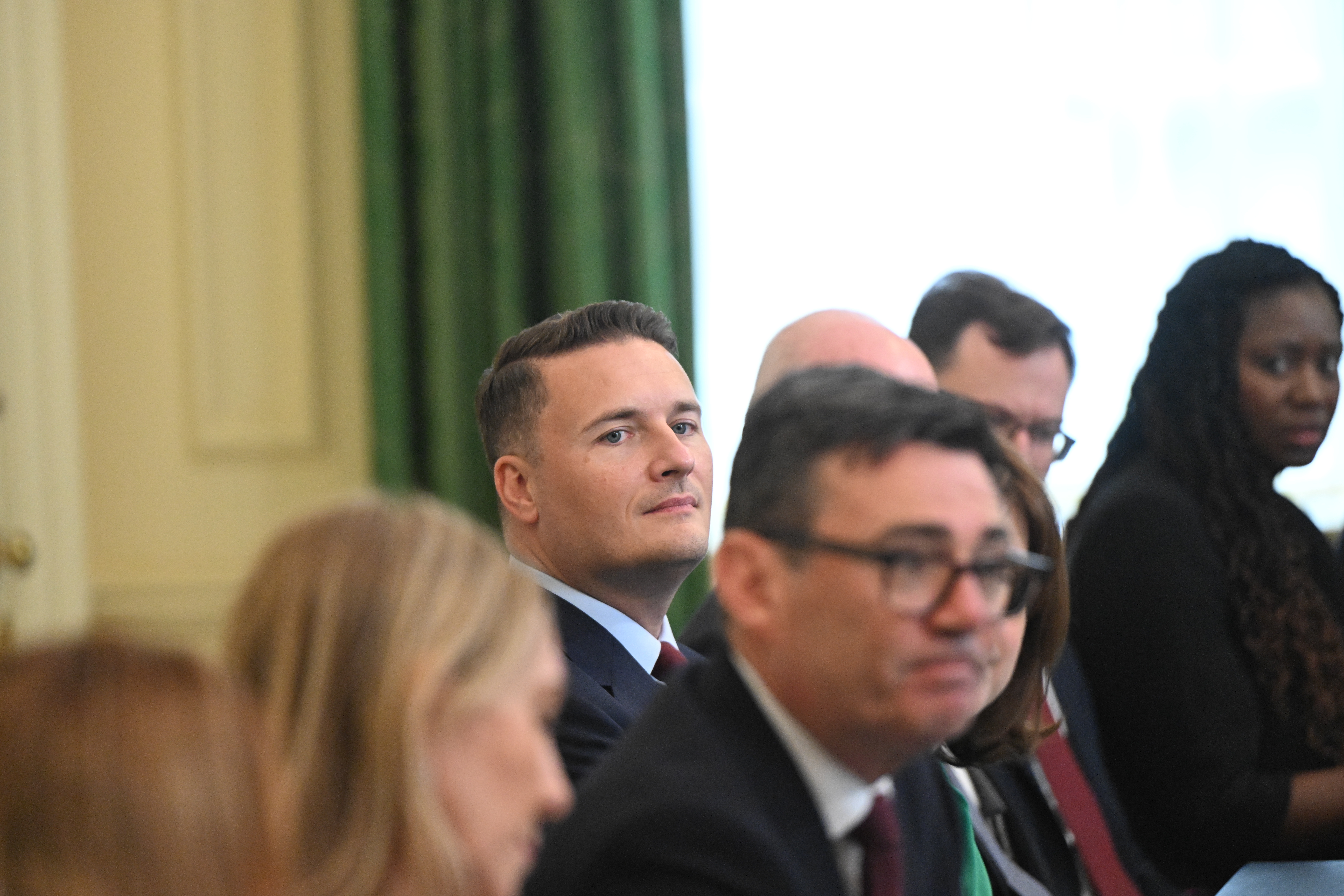 Britain's Defence Secretary Wes Streeting, center, attends the first cabinet meeting held by Prime Minister Andy Burnham at 10 Downing Street, London, Tuesday July 21, 2026. (Eddie Mulholland/Pool Photo via AP)