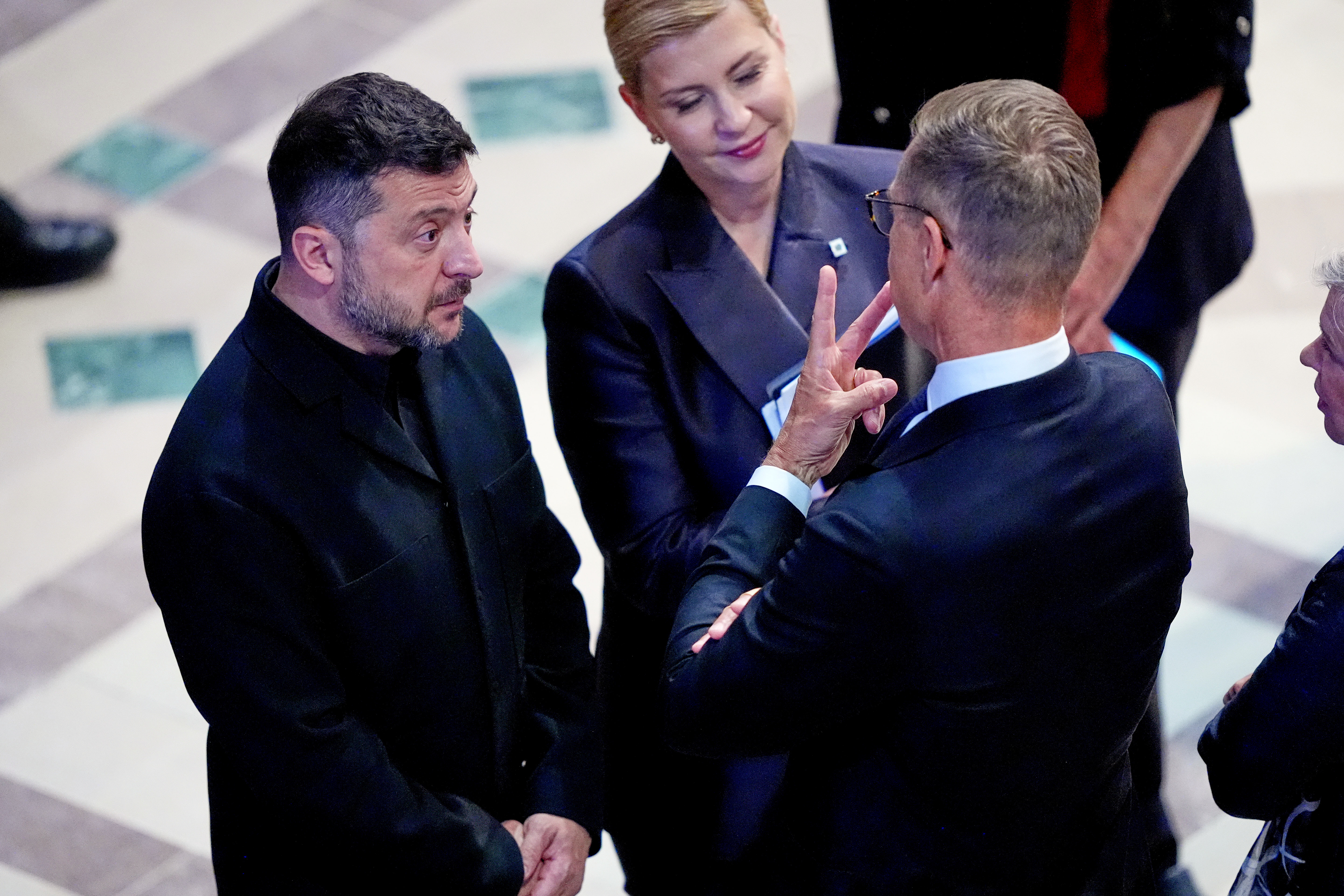 President of Ukraine, Volodymyr Zelenskyy, speaks with the President of Finland, Alexander Stubb, before the funeral service for Sen. Lindsey Graham, R-S.C., Tuesday July 28, 2026, at the Washington National Cathedral in Washington. (AP Photo/Jacquelyn Martin)
