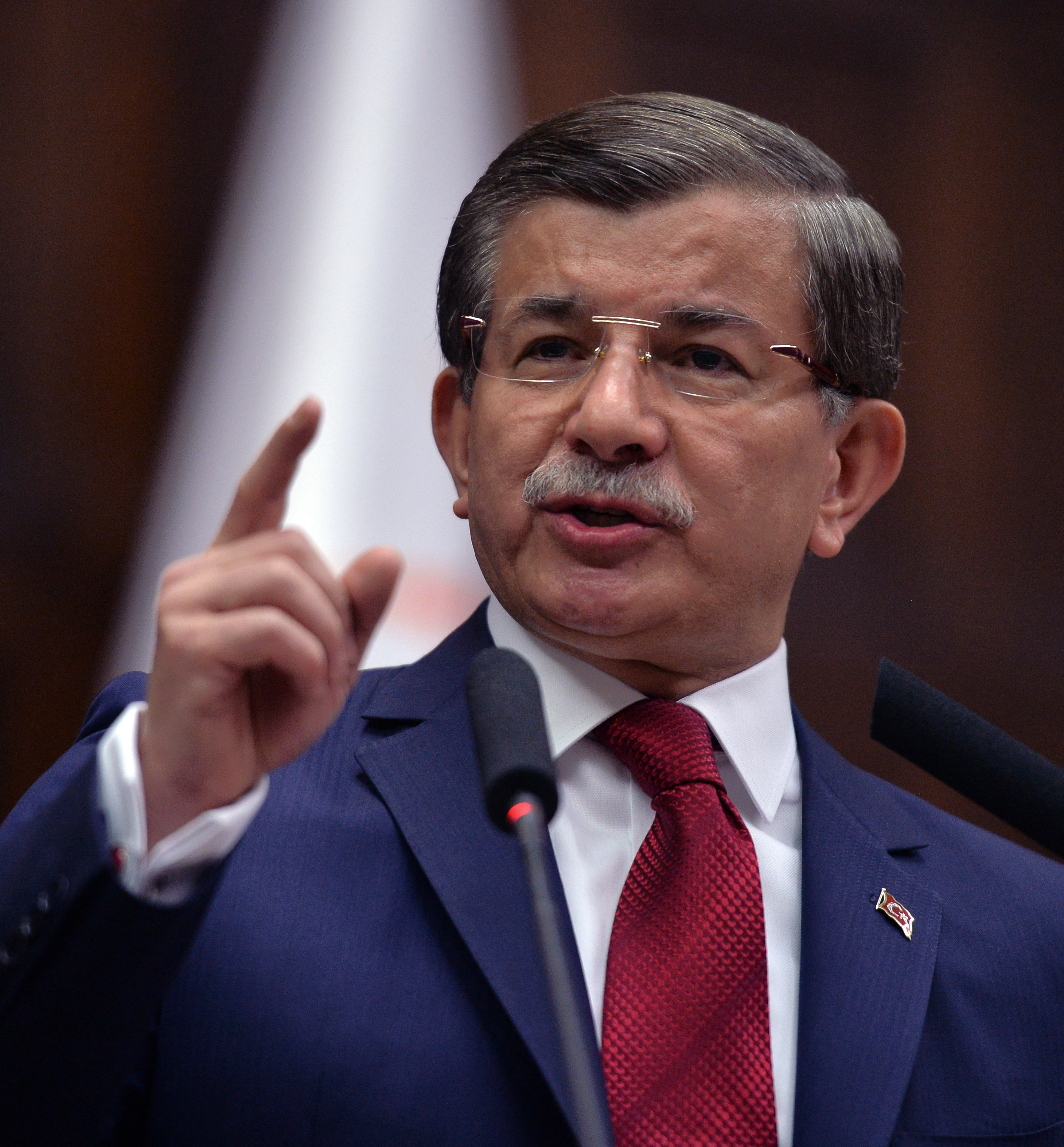 Turkey's Prime Minister Ahmet Davutoglu addresses his lawmakers at the parliament in Ankara, Turkey, Tuesday, May 3, 2016. Long-denied tensions between Turkey’s president Recep Tayyip Erdogan and prime minister Davutoglu are beginning to surface publicly, leading to speculation that the country’s powerful leader may be considering replacing the premier with a figure more willing to take a backseat role. (AP Photo)