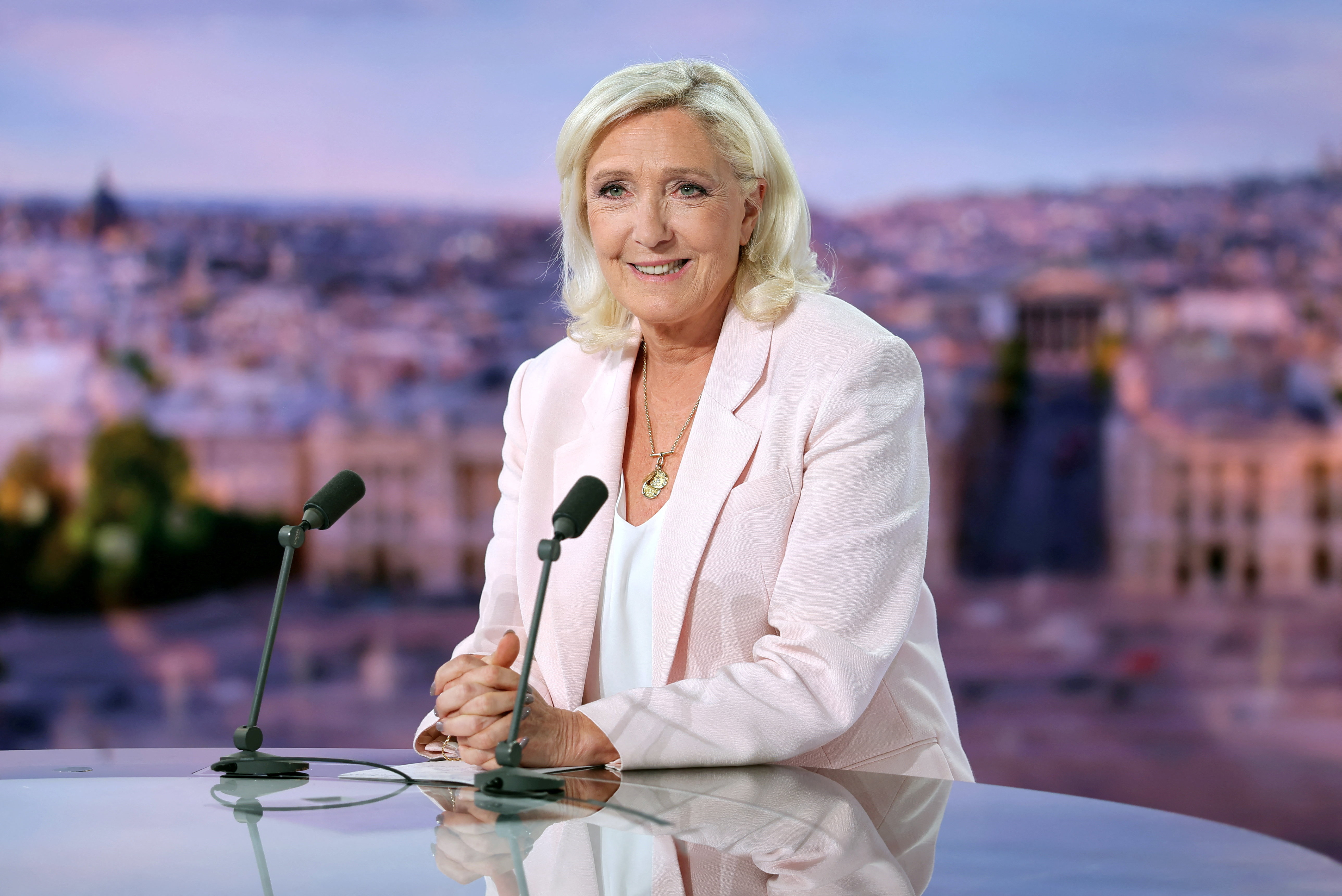 epa13096173 French far-right leader Marine Le Pen, member of parliament for the Rassemblement National (National Rally - RN) party, poses before an interview on the evening news broadcast of French TV channel TF1, following the verdict in her appeal trial over misuse of EU funds, in Boulogne-Billancourt, near Paris, France, 07 July 2026. EPA/Christian Hartmann / POOL MAXPPP OUT