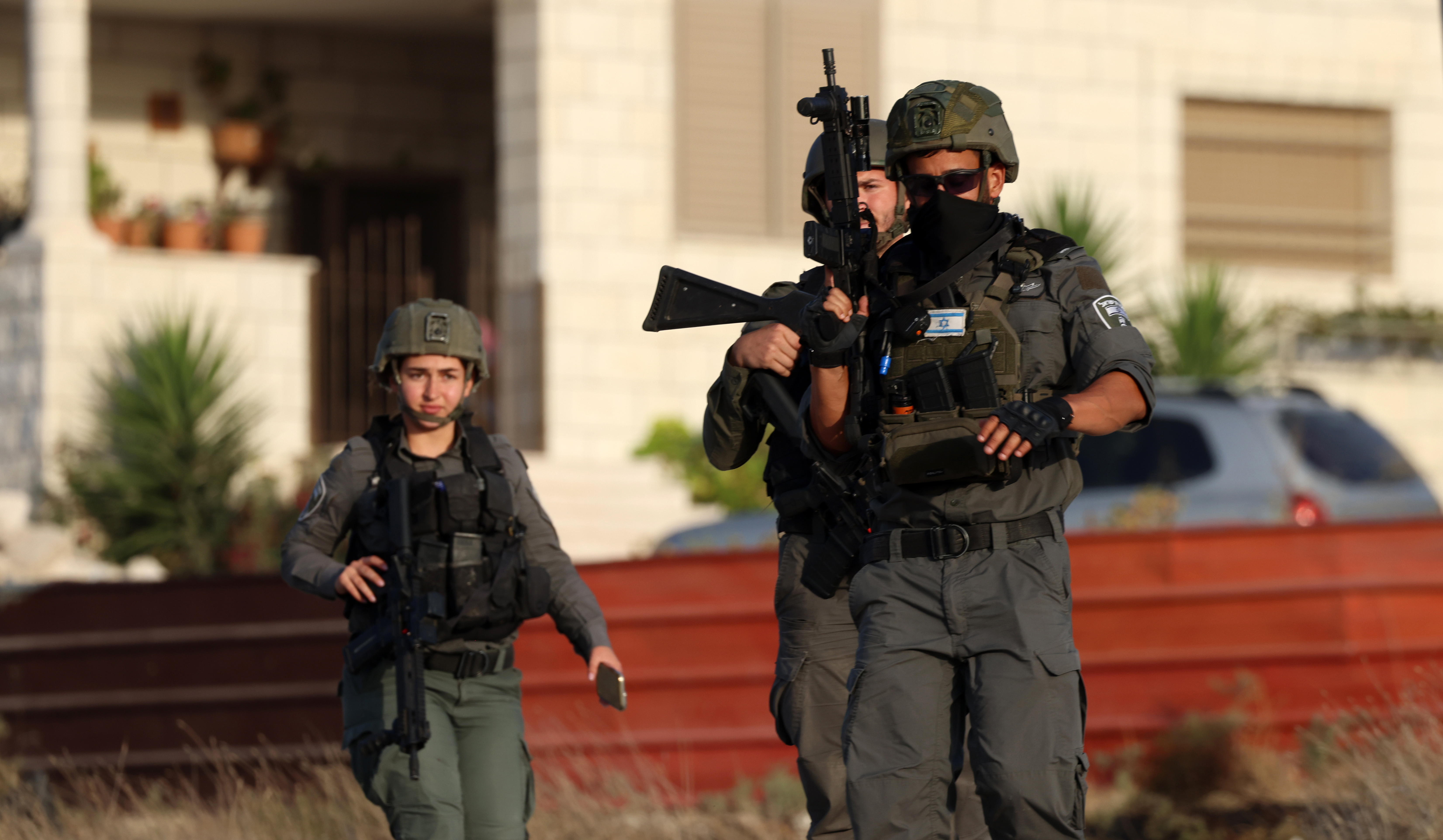 Armed soldiers stand out in public