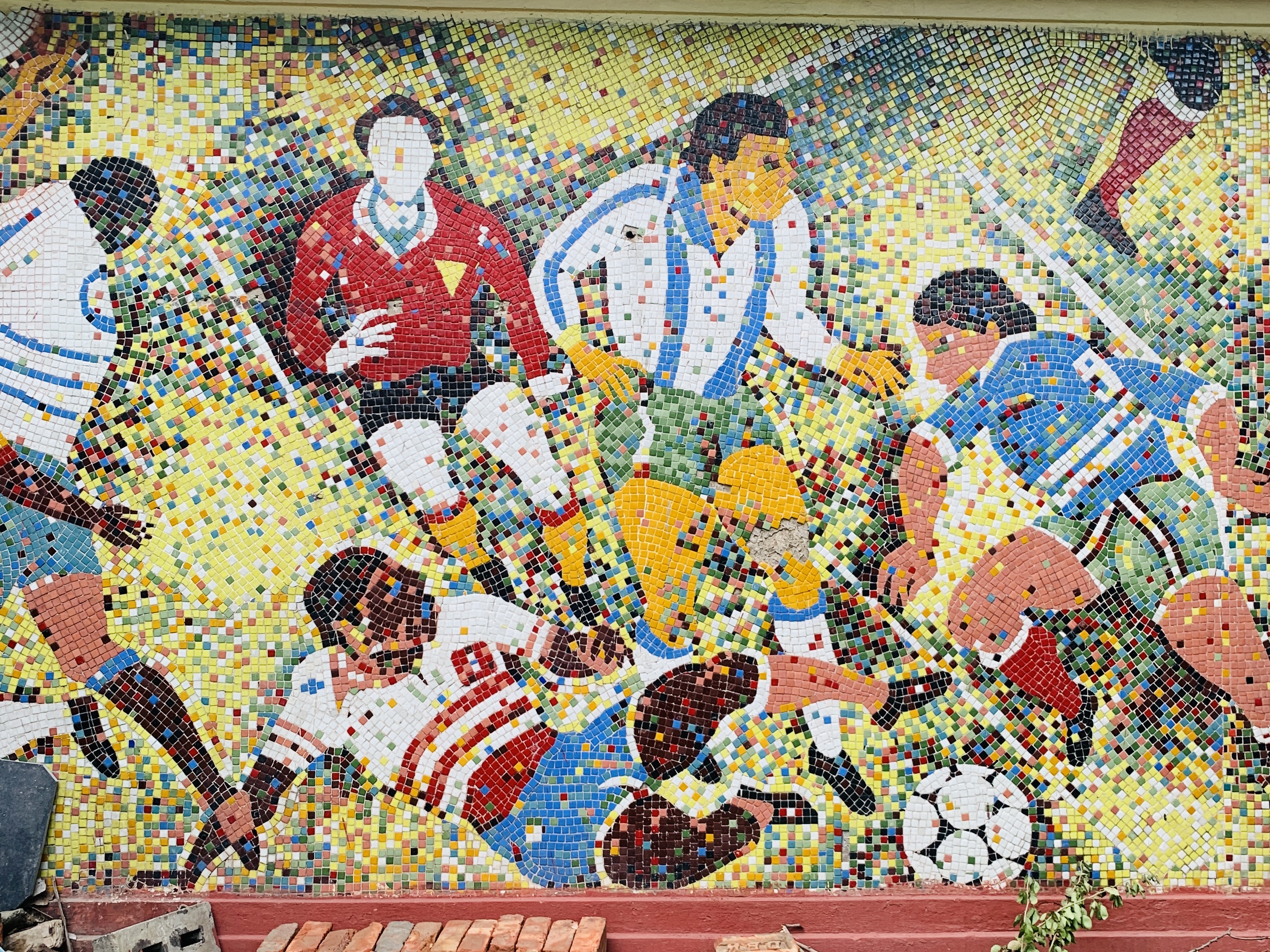 A football mural reflects Kolkata's love of the sport outside the Park Street metro station in Kolkata [Chandrahas Choudhury/Al Jazeera]