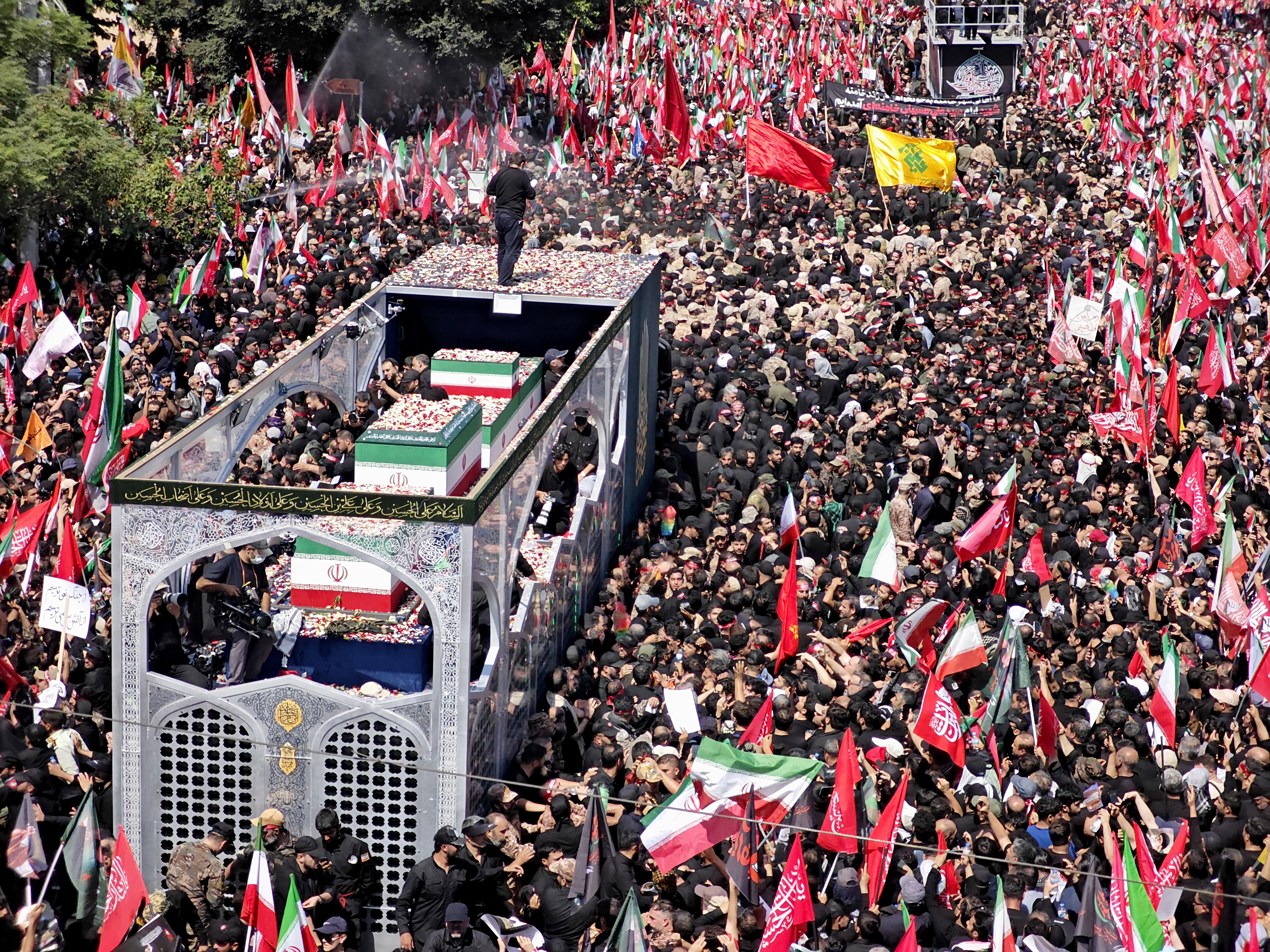 TEHRAN, IRAN - JULY 06: Mourners gather to pay final respects to Iran's slain Supreme Leader Ayatollah Ali Khamenei during the third day of his funeral ceremonies on July 06, 2026 in Tehran, Iran. Khamenei and members of his family were killed on February 28 during U.S.-Israeli strikes at the beginning of the war, bringing an end to his 36-year rule over Iran. A multi-city state funeral will be held over six days before his body is laid to rest on July 9, in his hometown of Mashhad, Iran. (Photo by Majid Saeedi/Getty Images)