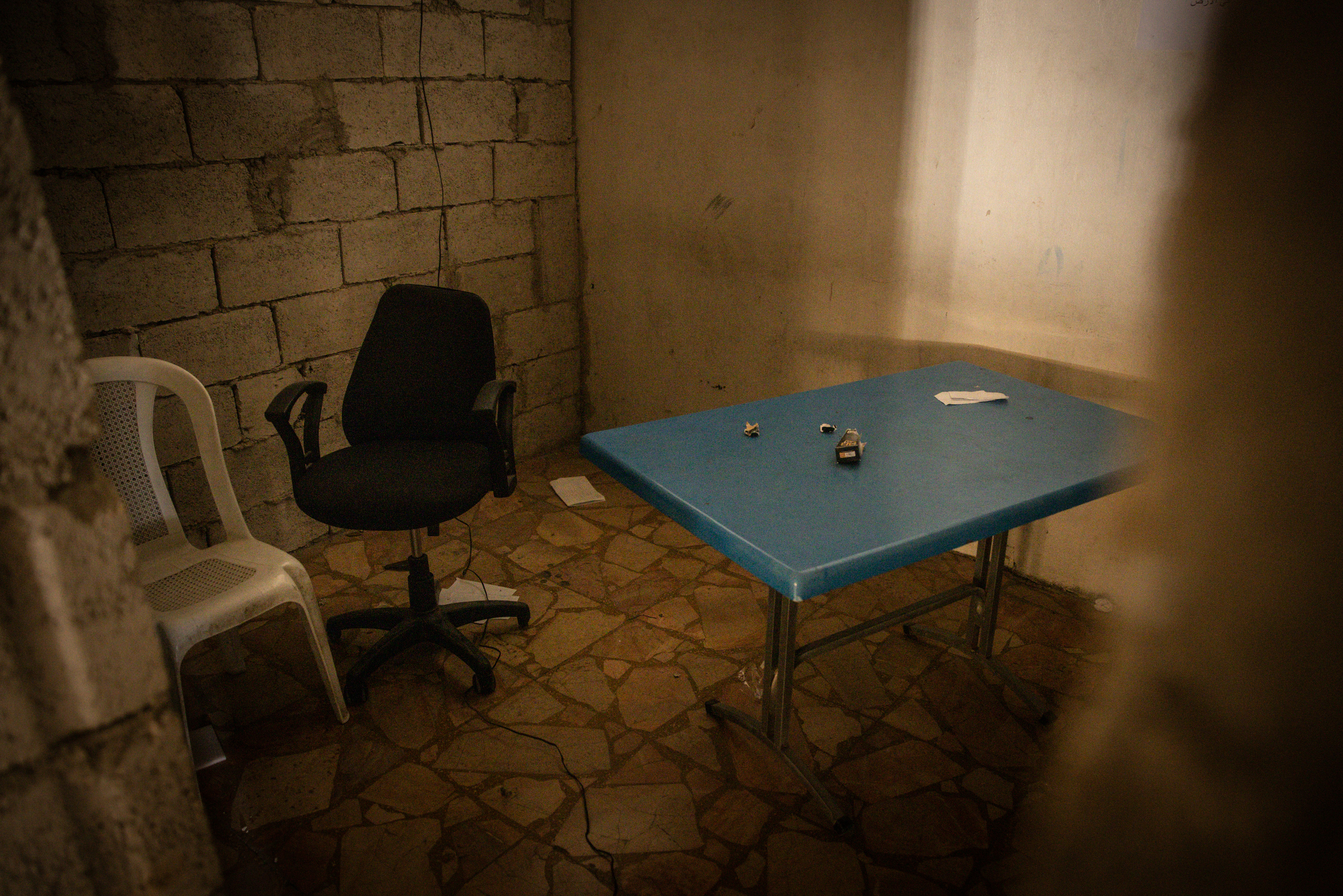 DAMASCUS, SYRIA - DECEMBER 15: An interrogation room is seen inside the prison of the Syrian Military Intelligence Branch 215 on December 15, 2024 in Damascus, Syria. The prison was notorious for violent interrogations, torture and killings. Rebel forces in Syria have retaken the capital from longtime ruler Bashar al-Assad, who fled the country for Moscow. The fall of the Assad regime marks a new chapter for Syria, which has been mired in a multi-party civil war since 2011, sparked by the Arab Spring uprisings. (Photo by Chris McGrath/Getty Images