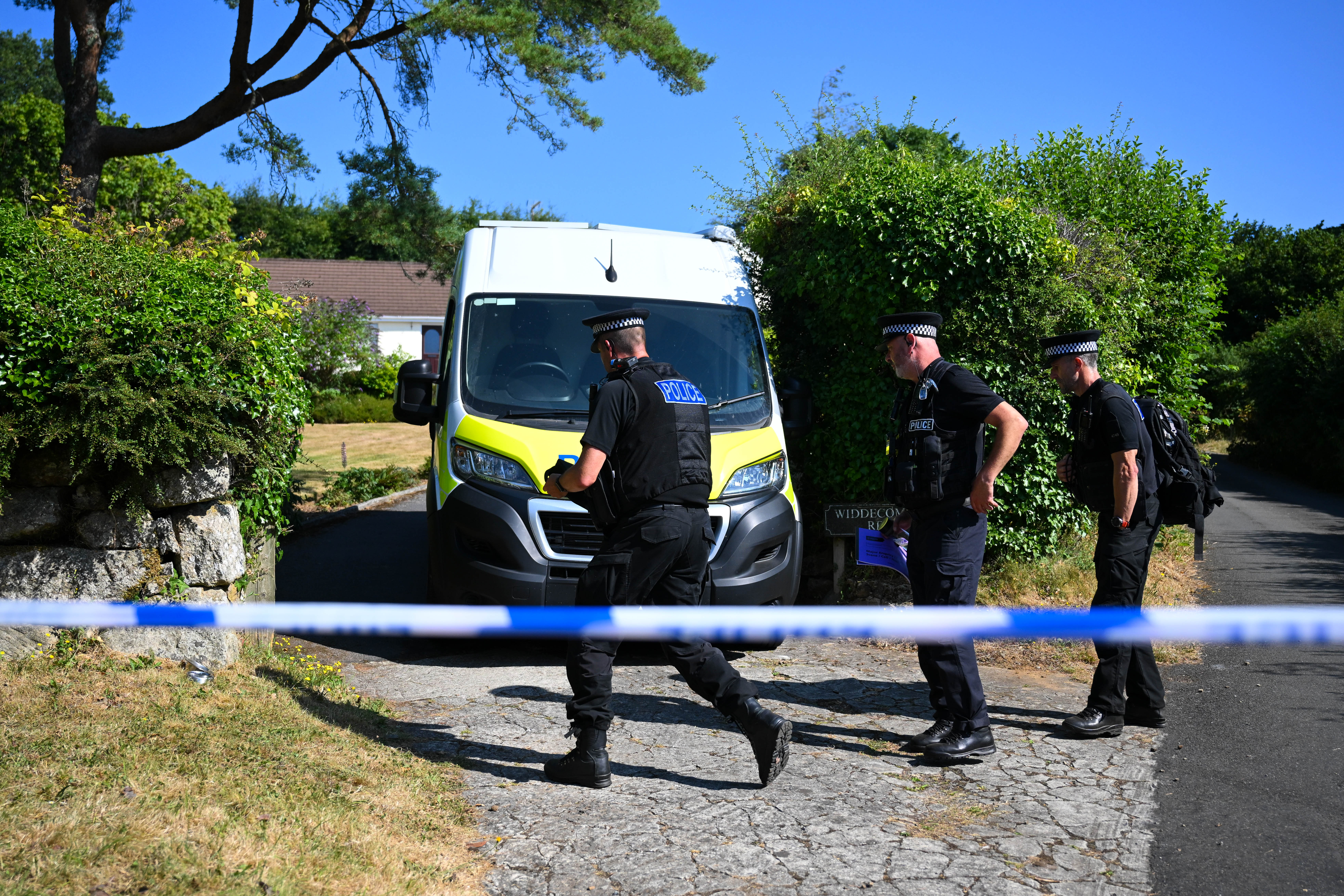 HAYTOR, ENGLAND - JULY 11: Police officers outside the house of Ann Widdecombe in Haytor on July 11, 2026 in Dartmoor, United Kingdom. The former Conservative Minister and MP for Maidstone and The Weald was found dead at her home on Dartmoor on Thursday morning having sustained serious head injuries. Police had arrested and questioned a 26-year-old local man but he was released without charge and is "no longer part of the investigation". Widdecombe, 78, joined The Brexit Party and later became a member of Reform UK. (Photo by Finnbarr Webster/Getty Images)