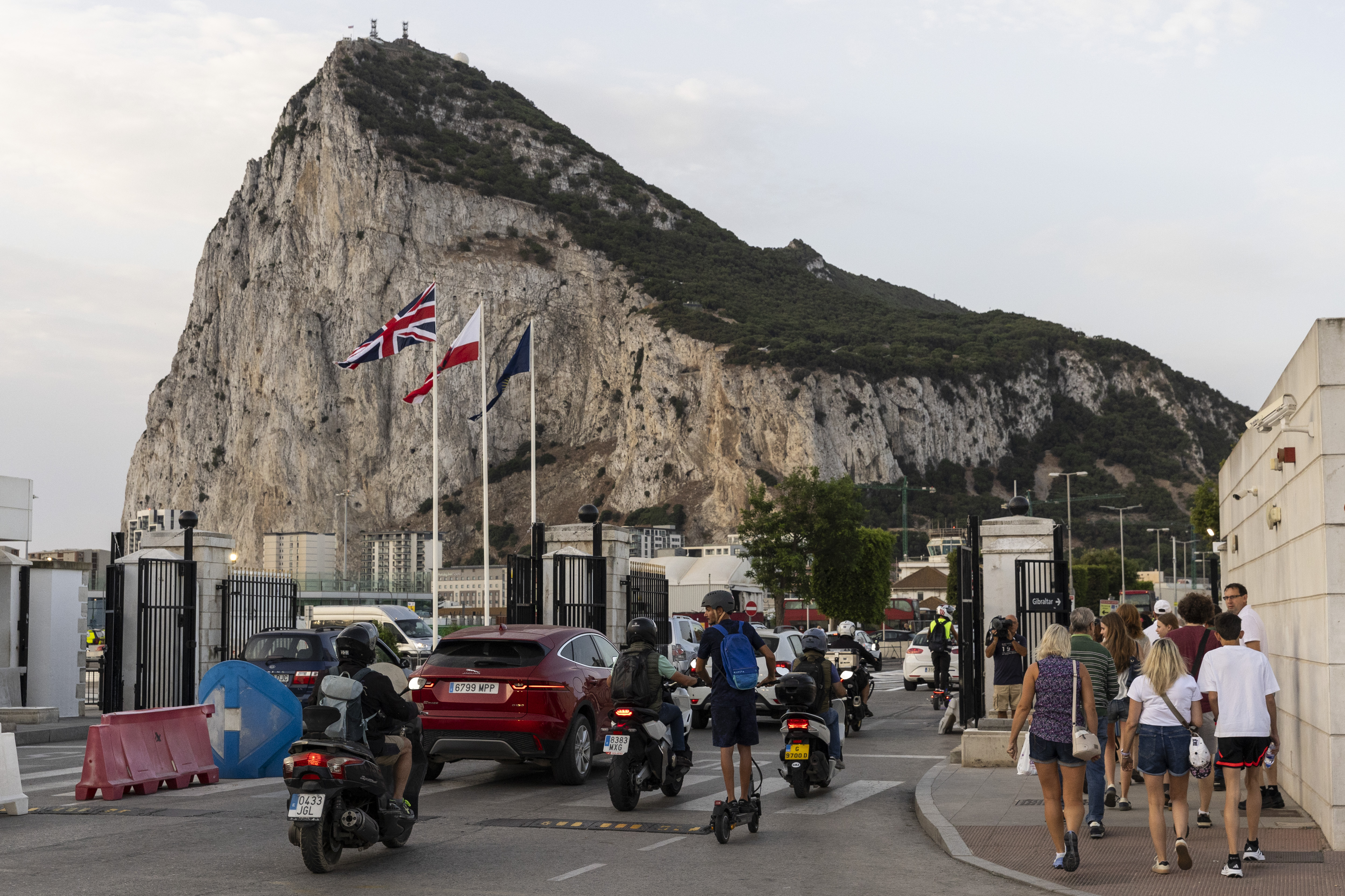 LA LINEA DE LA CONCEPCION - JULY 15: Workers cross the border into Gibraltar in the morning under the new Spain-Gibraltar border agreement on July 15, 2026 in La Linea de la Concepción, Spain. The 118-year-old physical border fence and land checkpoints separating Gibraltar and the Spanish border town of La Línea de la Concepción are being completely removed. This will end routine passport and customs checks at the land frontier as part of a post-Brexit treaty integrating Gibraltar into the EU's Schengen free-travel zone and customs union. (Photo by Pablo Blazquez Dominguez/Getty Images)