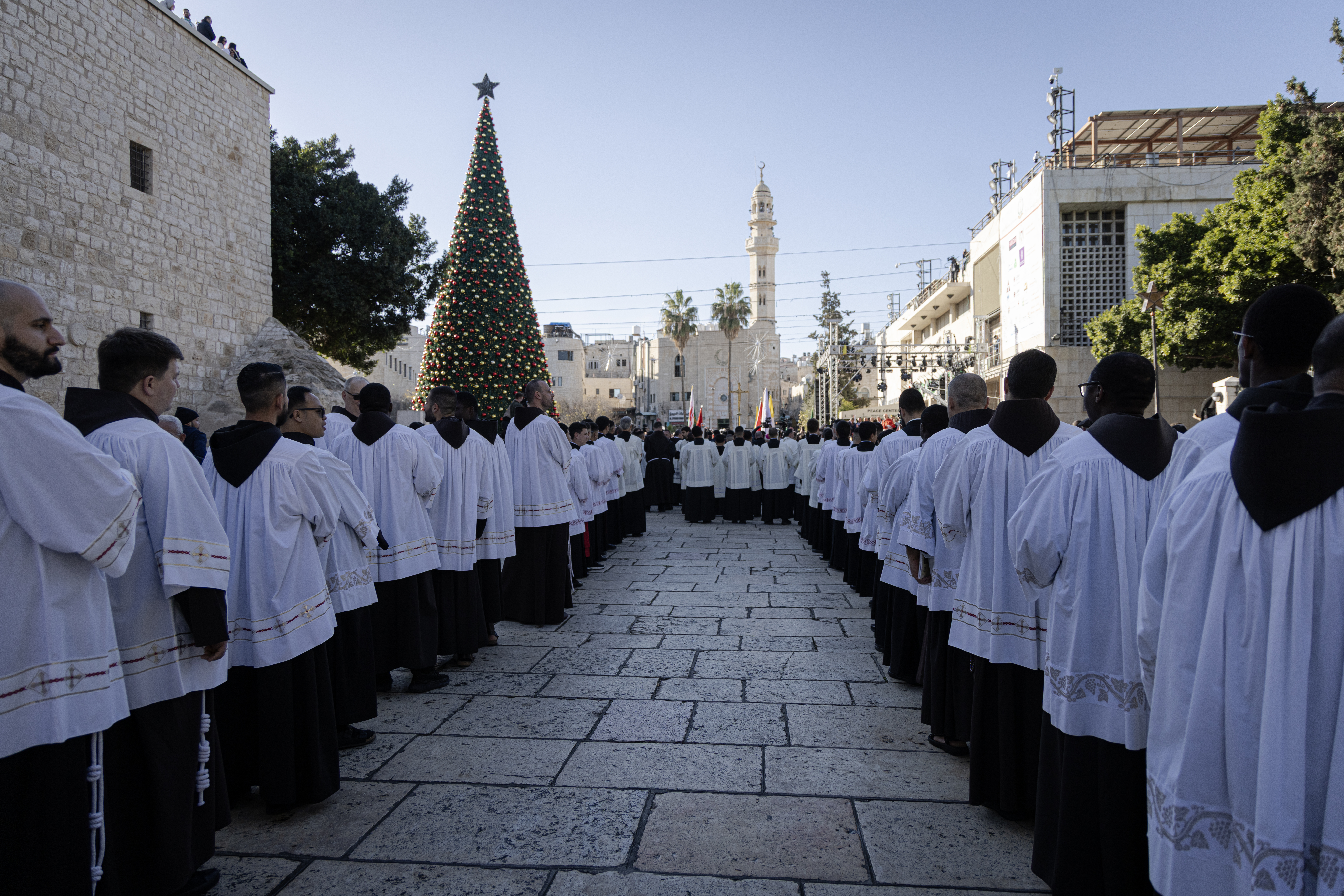 Members of the clergy take part in a procession.