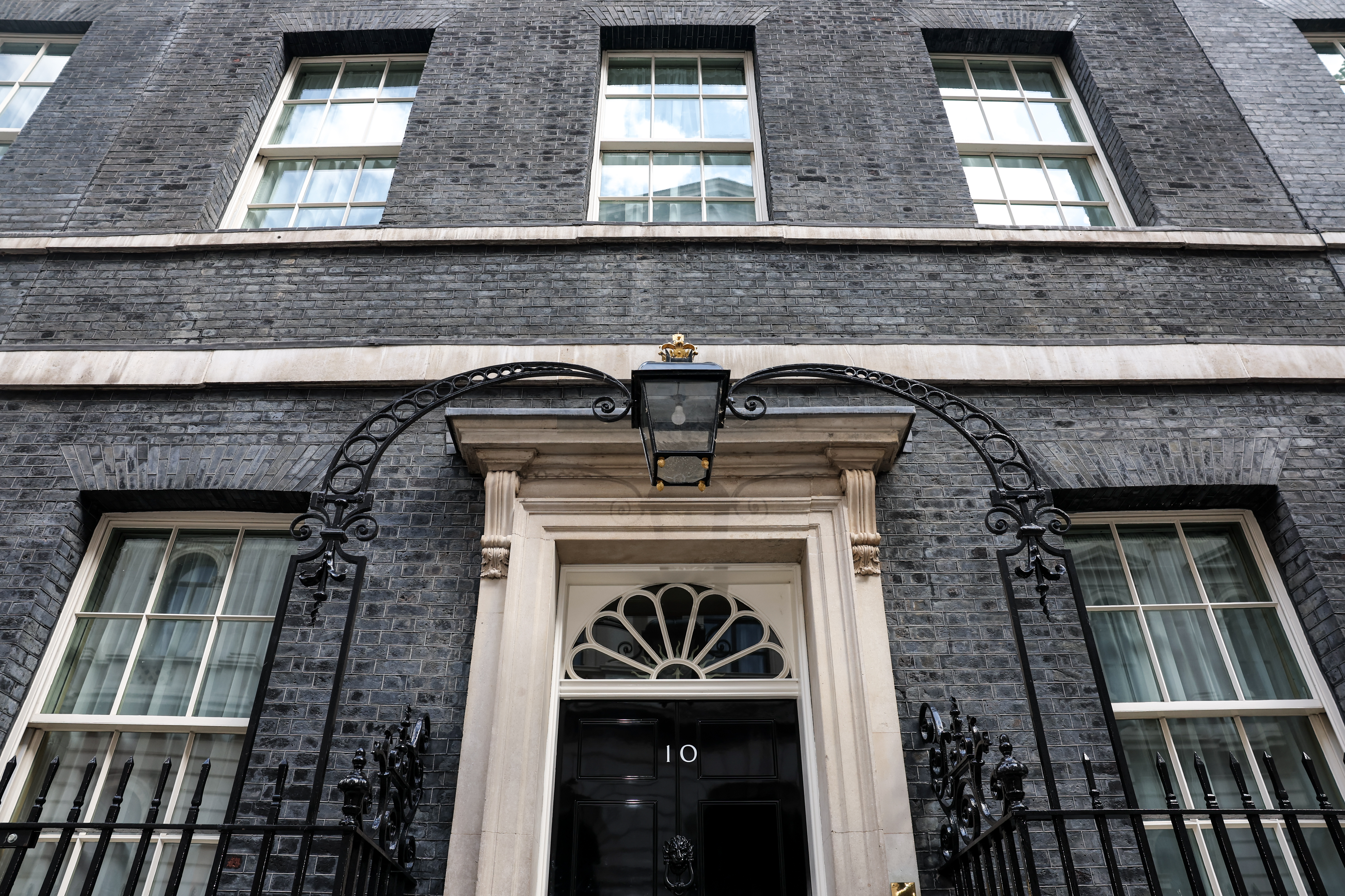 LONDON, ENGLAND - JULY 19: General view of the door at Number 10 Downing Street on July 19, 2026 in London, England. Labour Party Leader Andy Burnham will take over as Prime Minister following the resignation of Keir Starmer as Prime Minister. (Photo by Ryan Jenkinson/Getty Images)