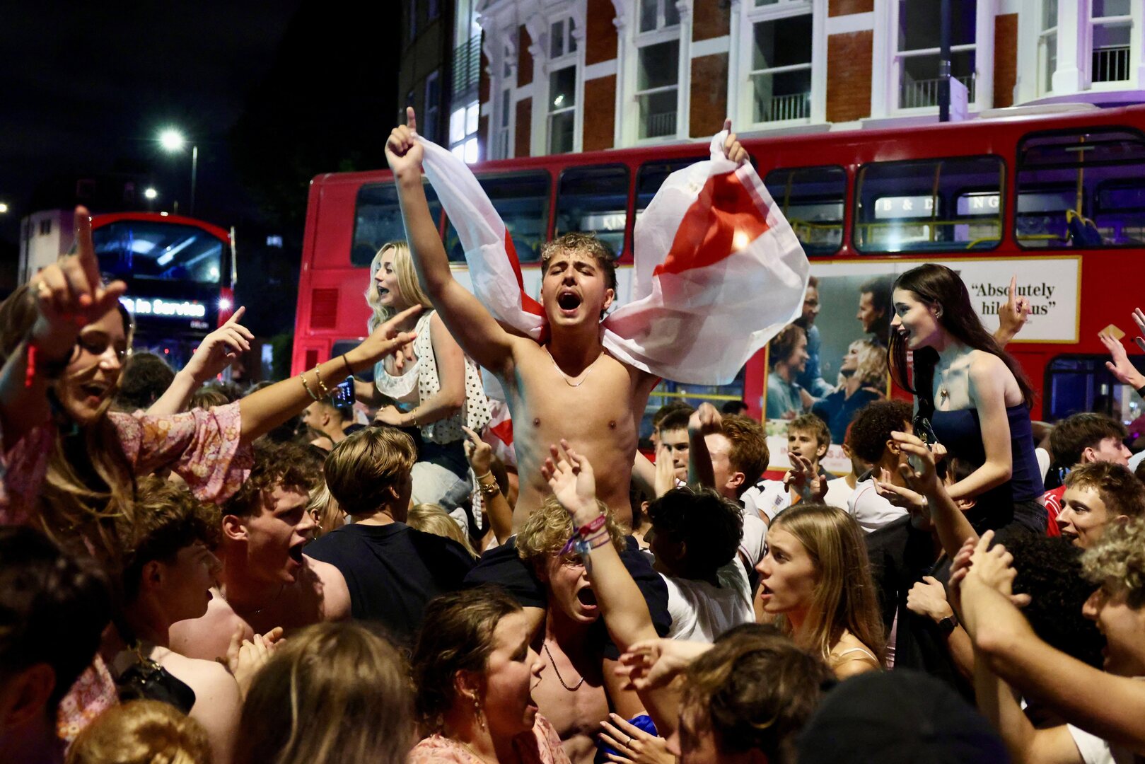 England fans celebrate in the streets after their win against Norway in the World Cup quarter-final, in Fulham, London, Britain on July 12, 2026. [Kevin Coombs/Reuters]