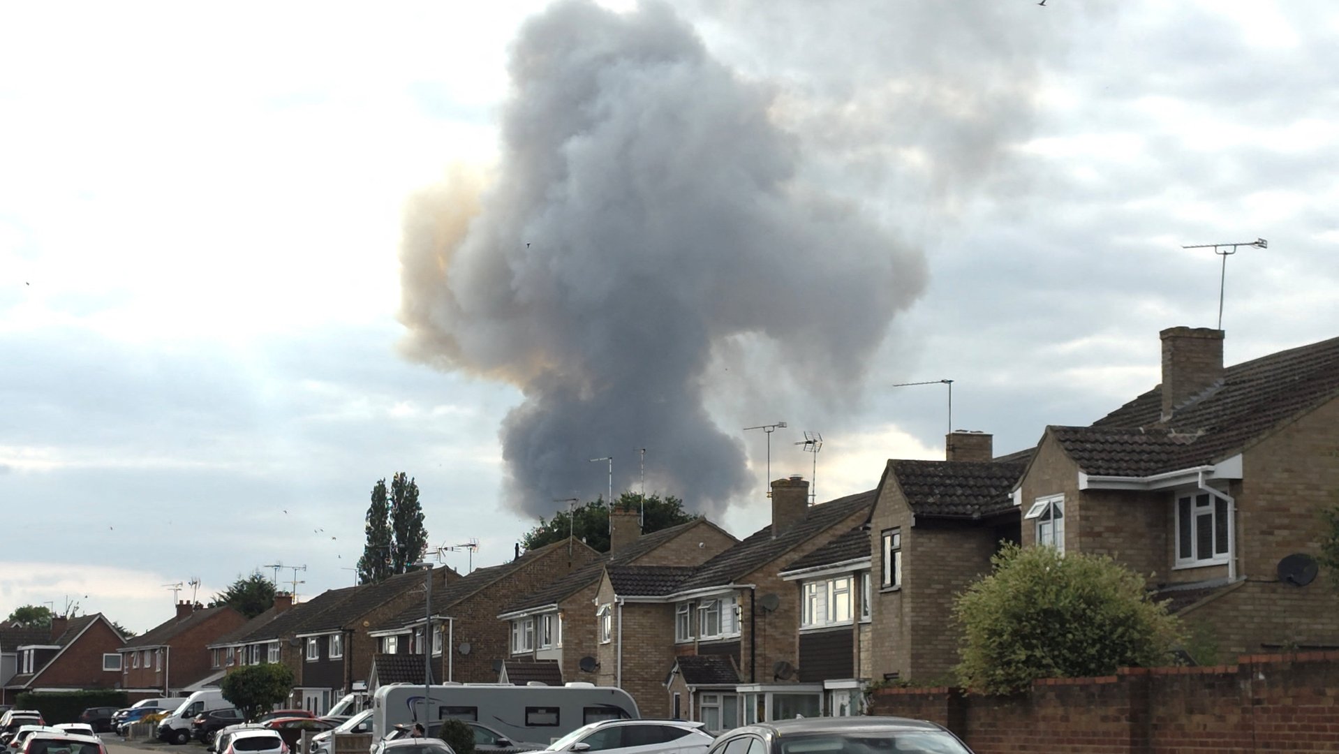Smoke billows from a fire at an Essex industrial unit, in Chelmsford, Britain, July 24, 2026, in this screengrab from video obtained from social media. @IBarr911 via X/via REUTERS