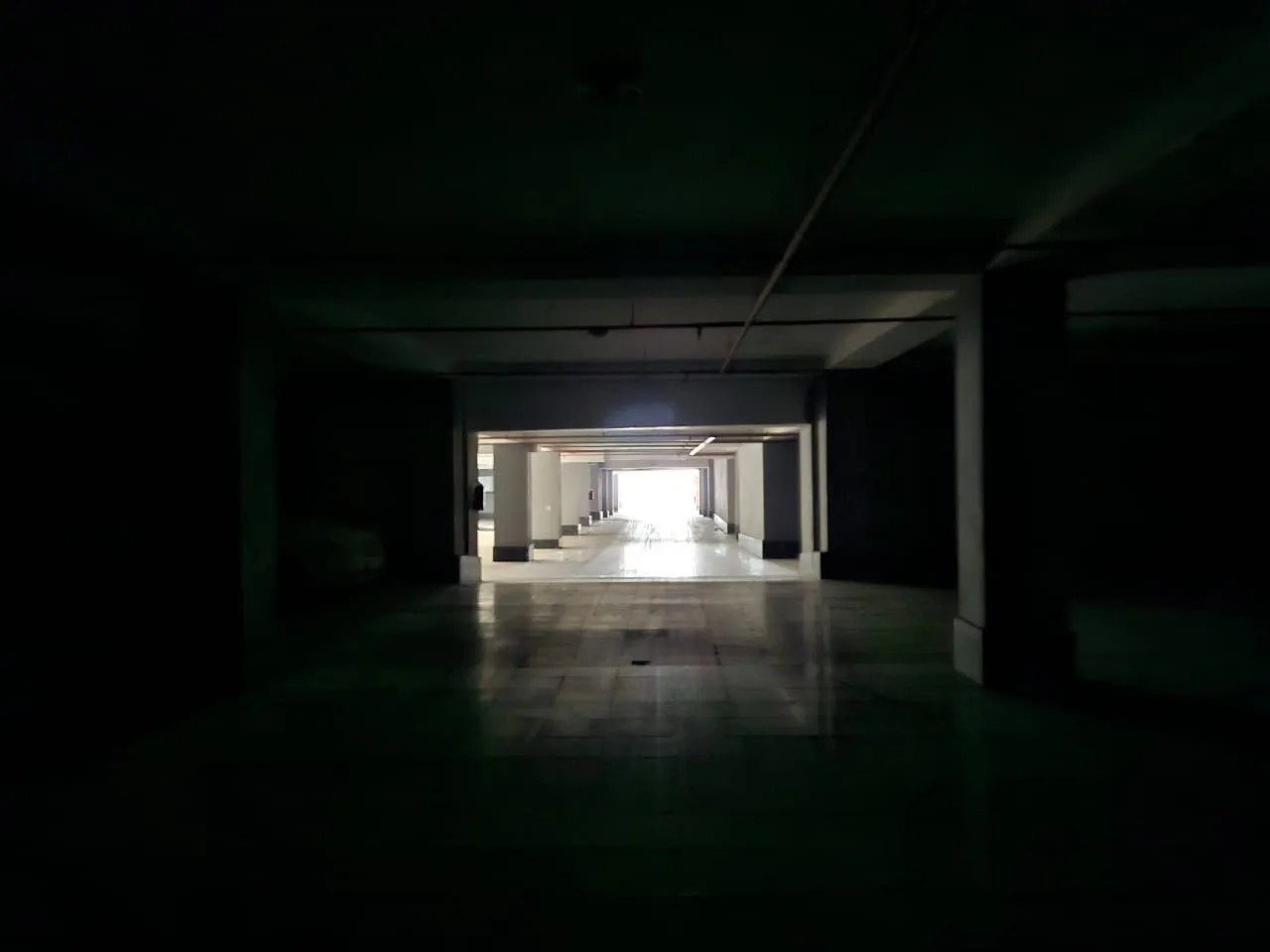 Pitch-black corridors and unlit facilities have become a daily reality as rolling blackouts plunge civilian infrastructure into darkness. [Rasol Alhaei/Al Jazeera]
