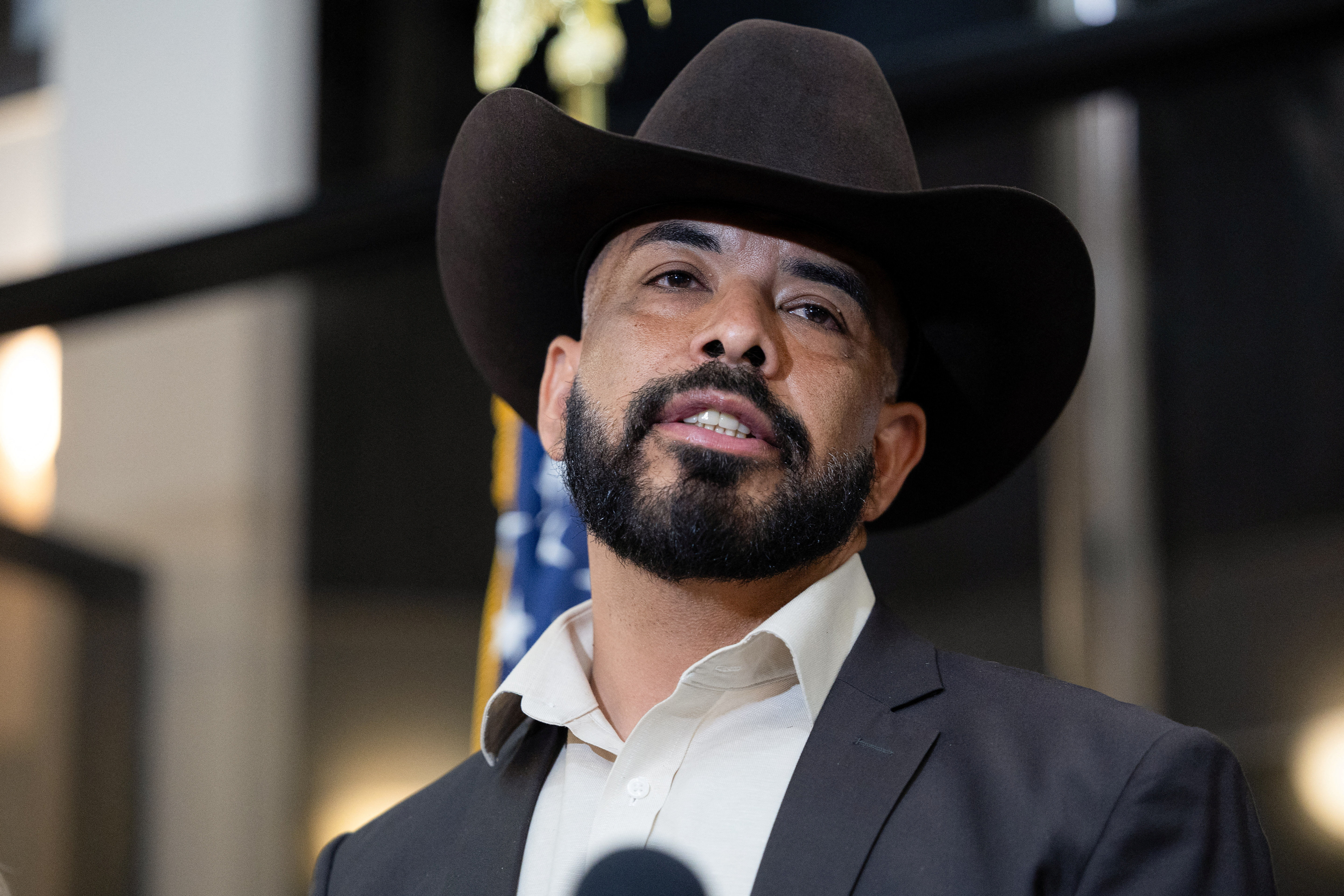 Hugo Balderas-Ibarra, an immigration attorney representing the three men who were passengers in the van driven by Salgado Araujo, speaks during a press conference regarding the fatal shooting of Mexican motorist Lorenzo Salgado Araujo by an ICE agent, in Houston, Texas, U.S., July 10, 2026. REUTERS/Antranik Tavitian