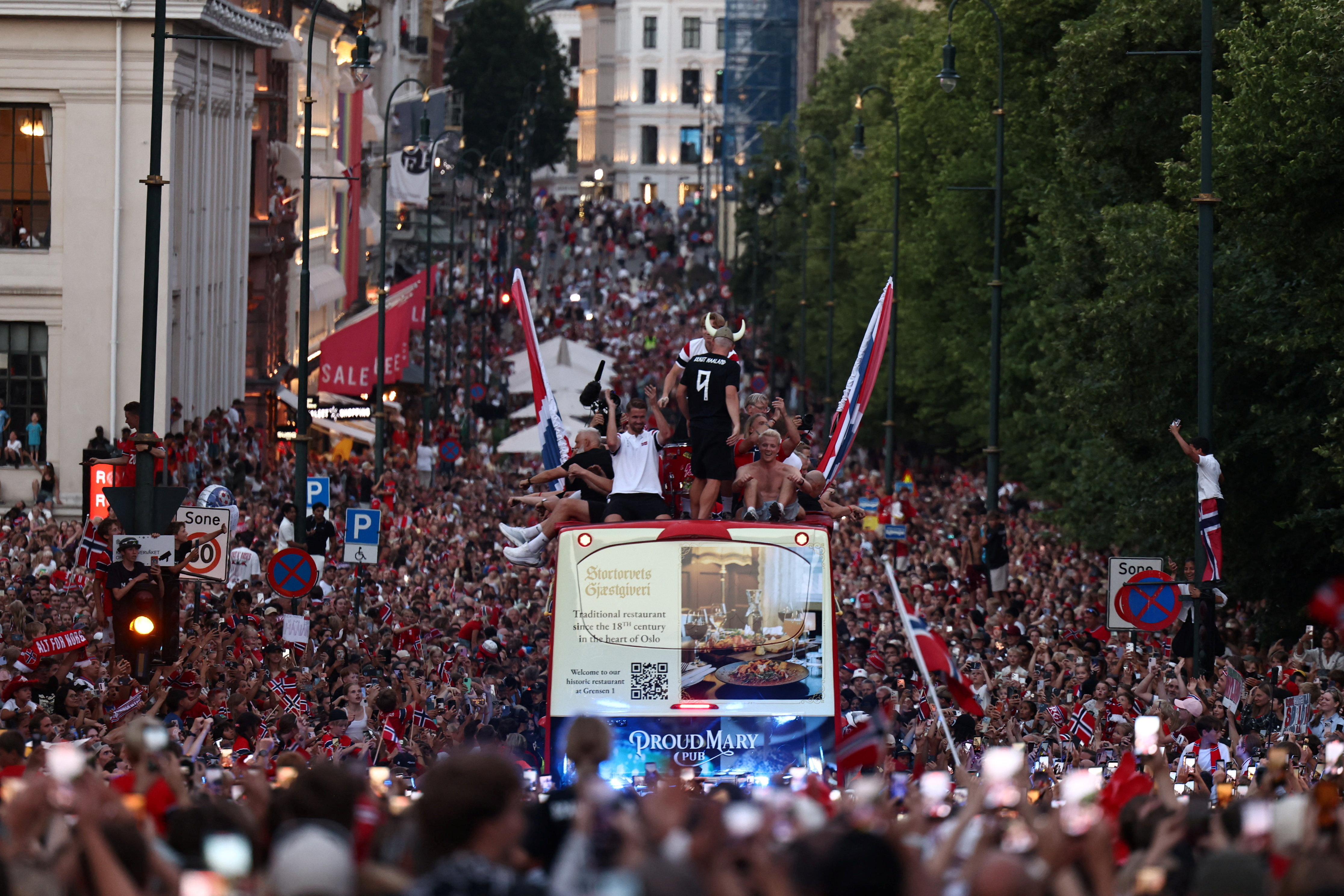 Members of the Norwegian men’s football team and their staff take part in an open-top bus parade through the streets to celebrate their performance in the World Cup after returning to Oslo, Norway, July 13, 2026. REUTERS/Tom Little TPX IMAGES OF THE DAY