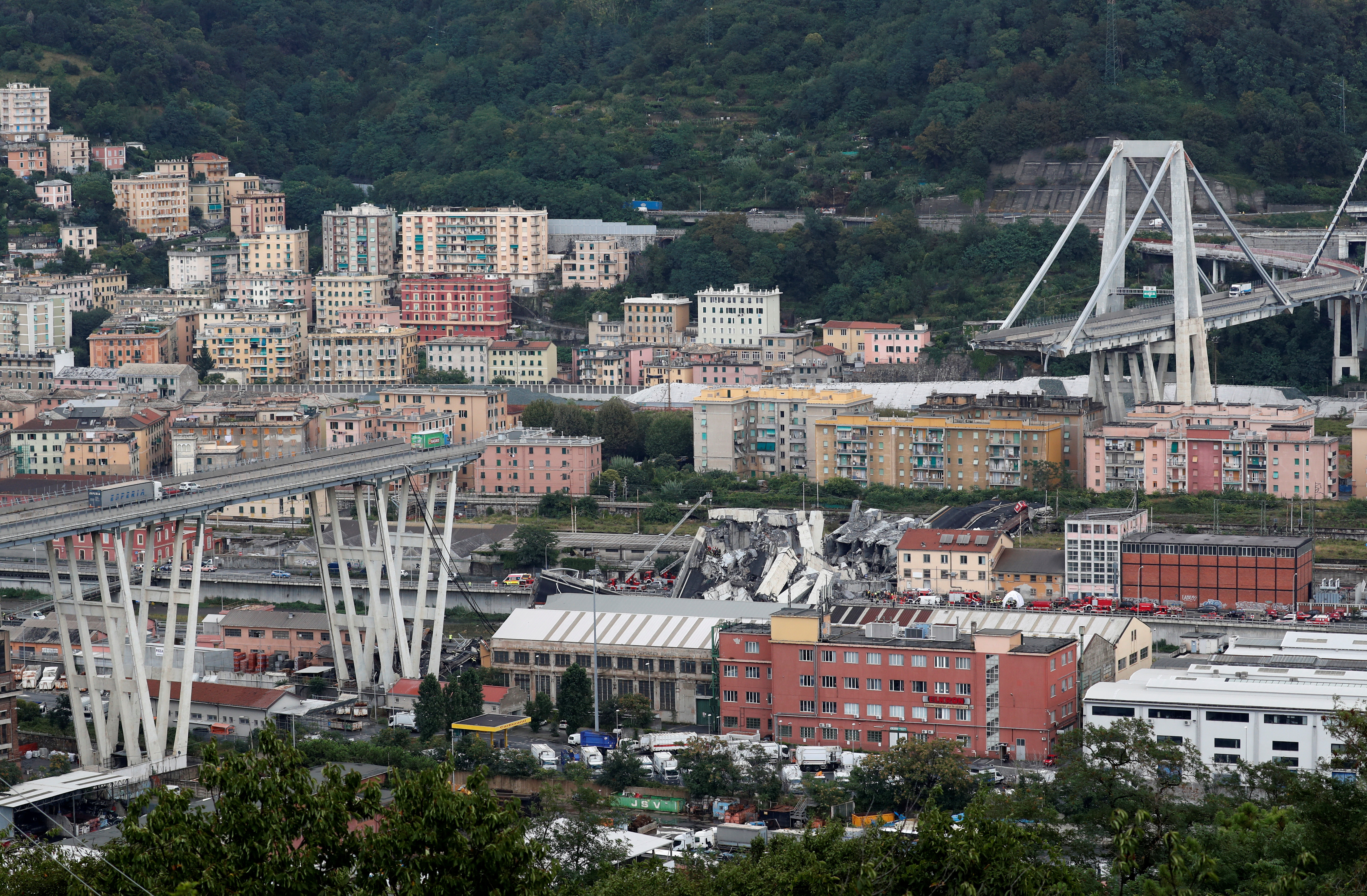 FILE PHOTO: The collapsed Morandi Bridge is seen in the Italian port city of Genoa, Italy, August 14, 2018. REUTERS/Stefano Rellandini/File Photo