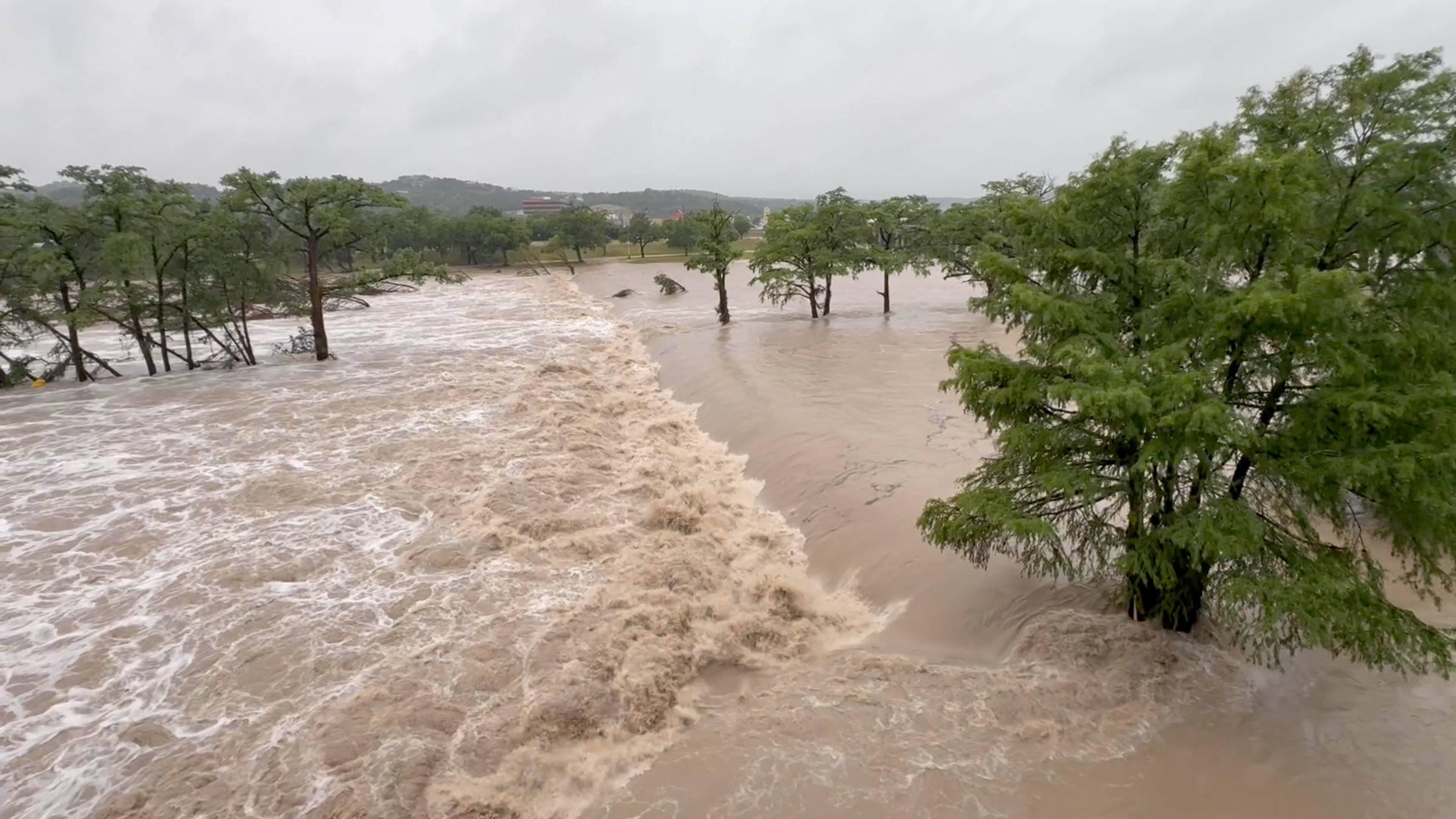 Flooding as heavy rains and severe weather hit southern Texas, in Kerrville, Texas, U.S., July 16, 2026, in this screen grab taken from a social media video. @stephen.fortney via Instagram/via REUTERS THIS IMAGE HAS BEEN SUPPLIED BY A THIRD PARTY. MANDATORY CREDIT. NO RESALES. NO ARCHIVES. VERIFICATION: - Location and date verified by metadata on original file. - Buildings, structures and water tankers in the video matched satellite and archive imagery.