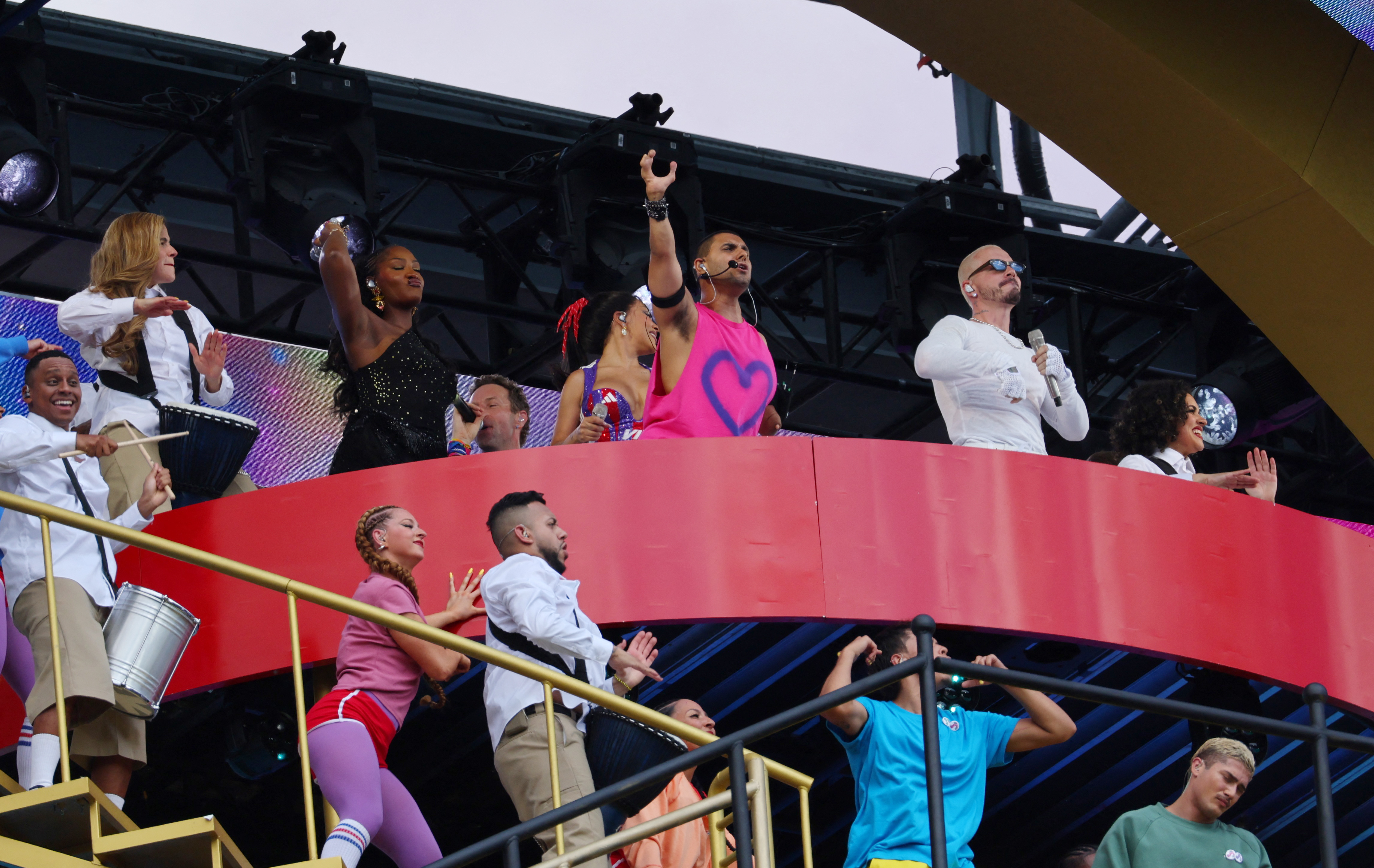 Emmanuel Kelly performs alongside Coldplay at FIFA Club World Cup halftime show.