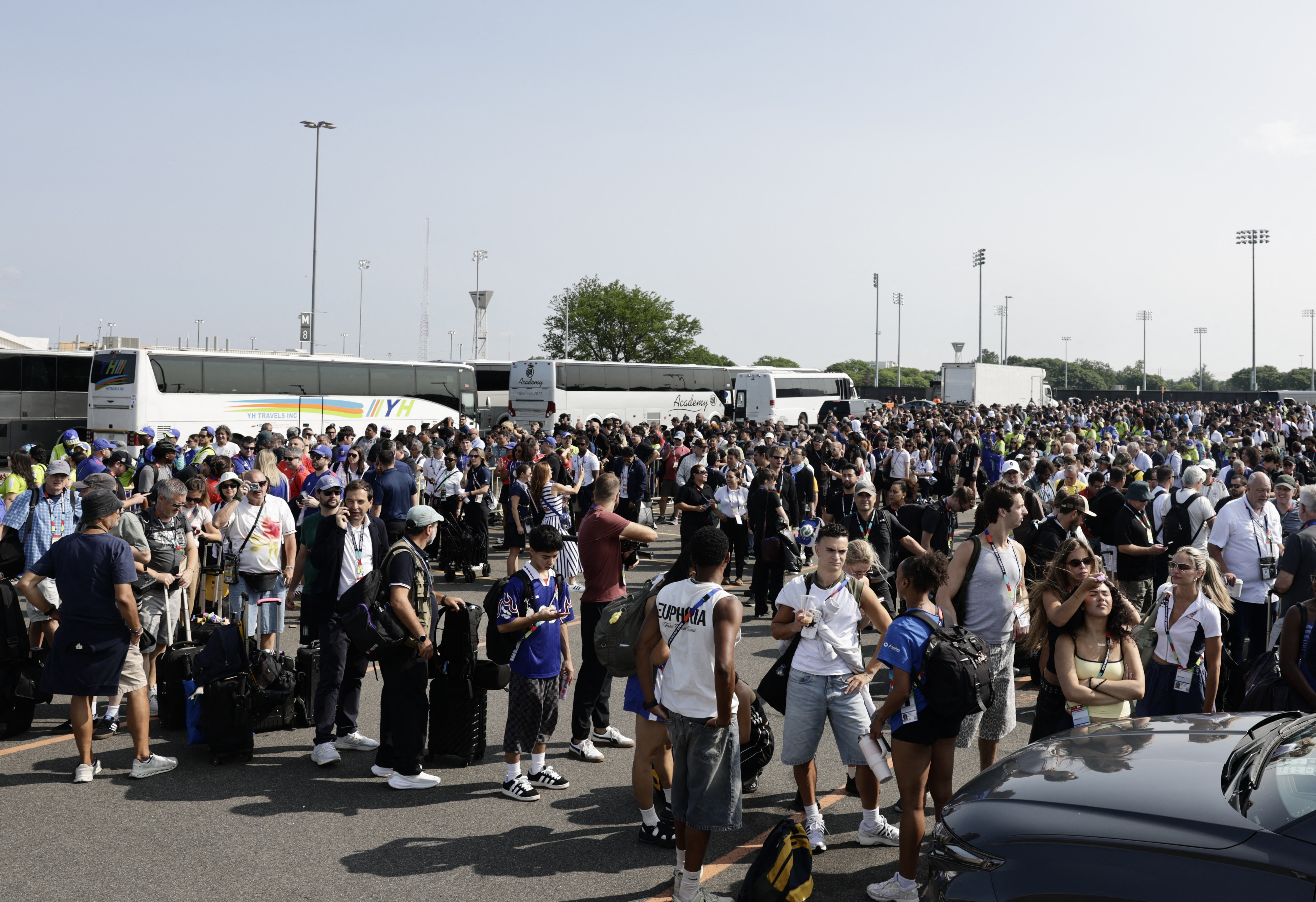 Soccer Football - FIFA World Cup 2026 - Final - Spain v Argentina - New York/New Jersey Stadium, East Rutherford, New Jersey, U.S. - July 19, 2026 Members of the media and staff queue outside the stadium before the match REUTERS/Jeenah Moon