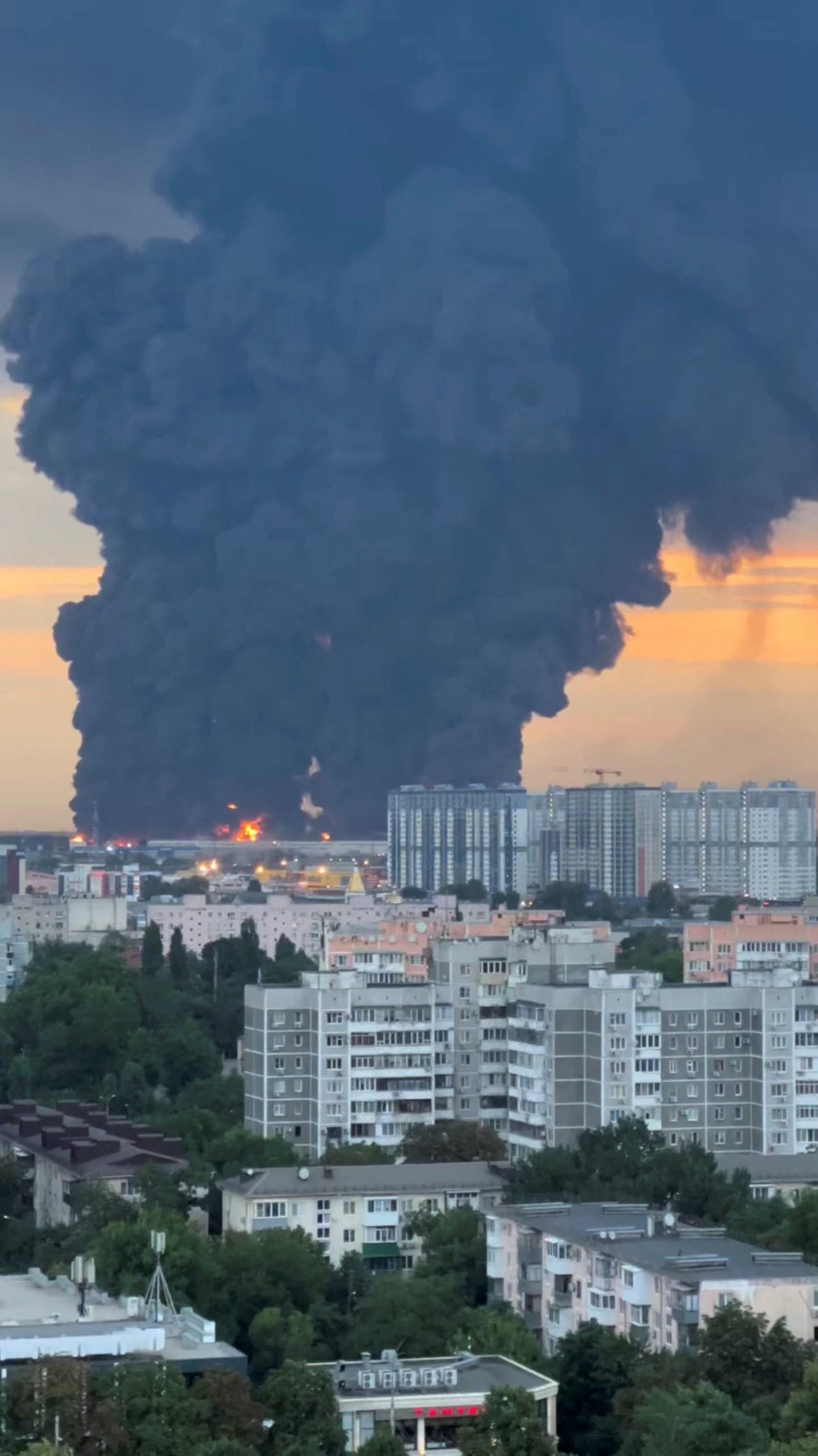 Smoke rises from a Wildberries warehouse on fire after an attack in Krasnodar, Russia, July 22, 2026, in this still image obtained from social media video. Social Media/via REUTERS THIS IMAGE HAS BEEN SUPPLIED BY A THIRD PARTY. NO RESALES. NO ARCHIVES. NEWS USE ONLY. VERIFICATION: - Buildings, roofs, vegetation and road layout matched archive and satellite images. - Date confirmed by reports from local authorities and Wildberries company. - Krasnodar Mayor Yevgeny Naumov wrote on Telegram on July 22 that fire broke out at a logistics warehouse after drone attack in Krasnodar. - Tatyana Kim, the head and co-founder of Wildberries, said on Wednesday on Telegram that warehouses in Krasnodar had been attacked.