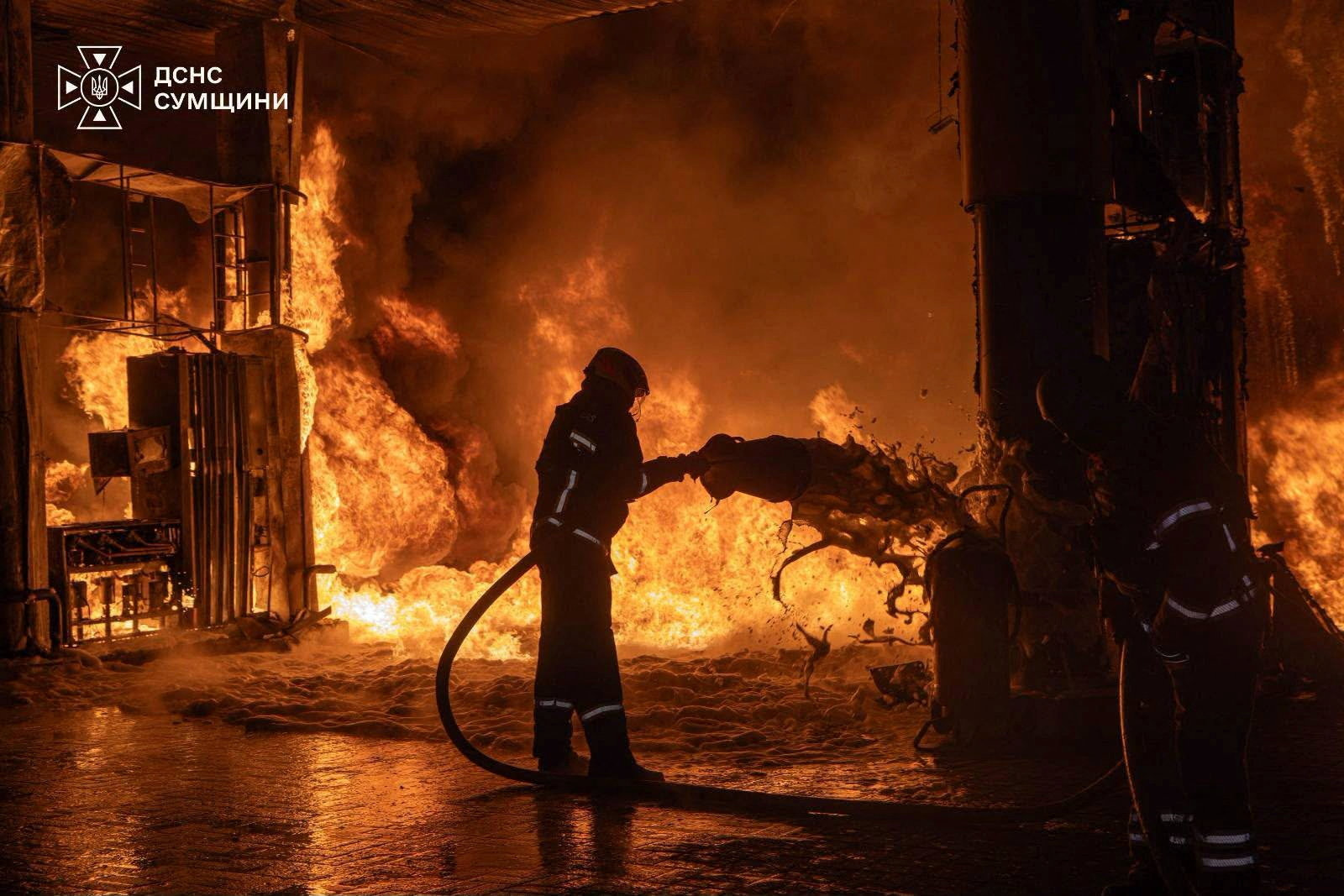 A firefighter works at the site of a petrol station hit by a Russian drone strike, amid Russia's attack on Ukraine, in Sumy, Ukraine, in this handout picture released July 23, 2026. Press service of the State Emergency Service of Ukraine/Handout via REUTERS ATTENTION EDITORS - THIS IMAGE HAS BEEN SUPPLIED BY A THIRD PARTY. DO NOT OBSCURE LOGO.