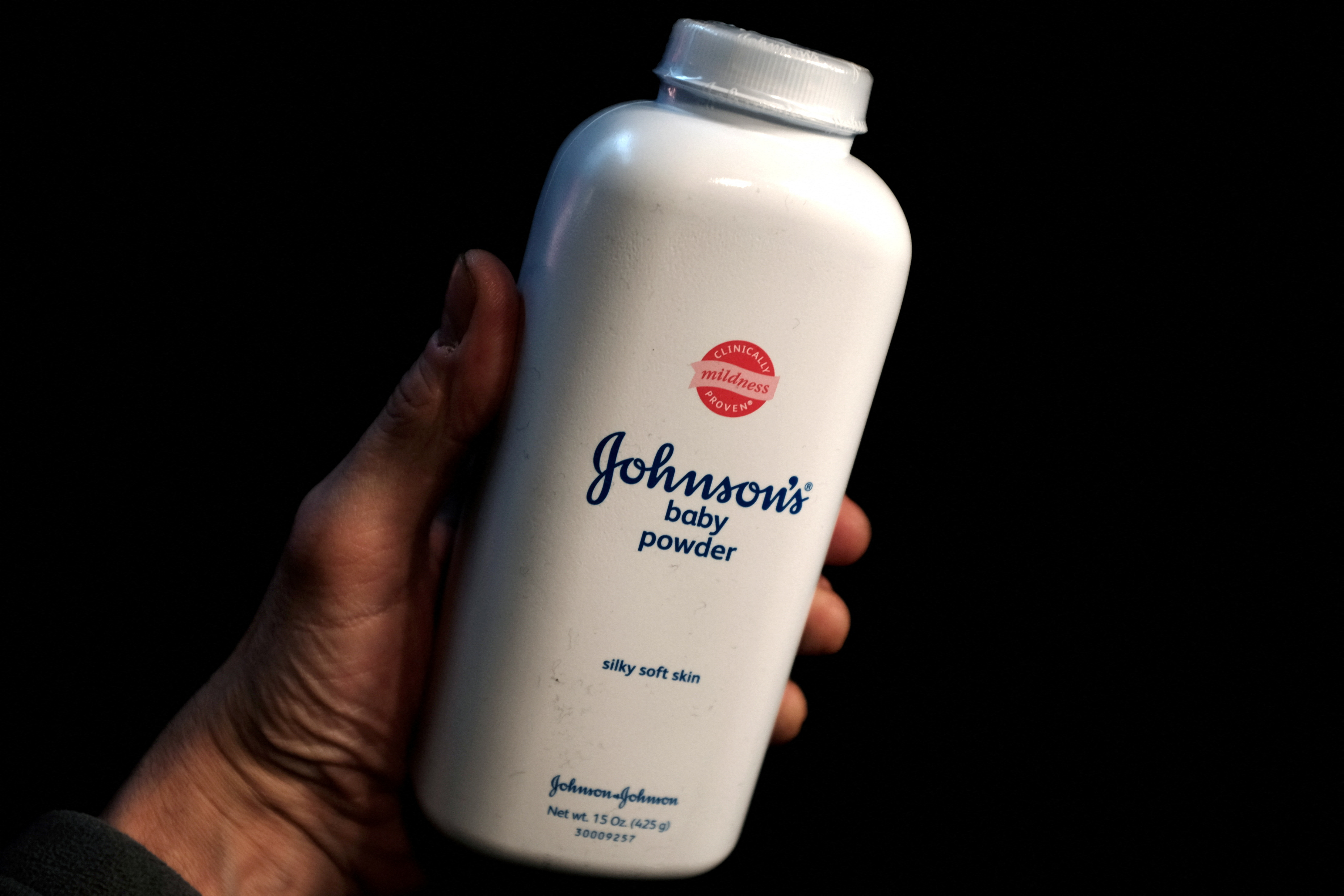 FILE PHOTO: A bottle of Johnson and Johnson Baby Powder is seen in a photo illustration taken in New York, February 24, 2016. REUTERS/Mike Segar/Illustration/File Photo