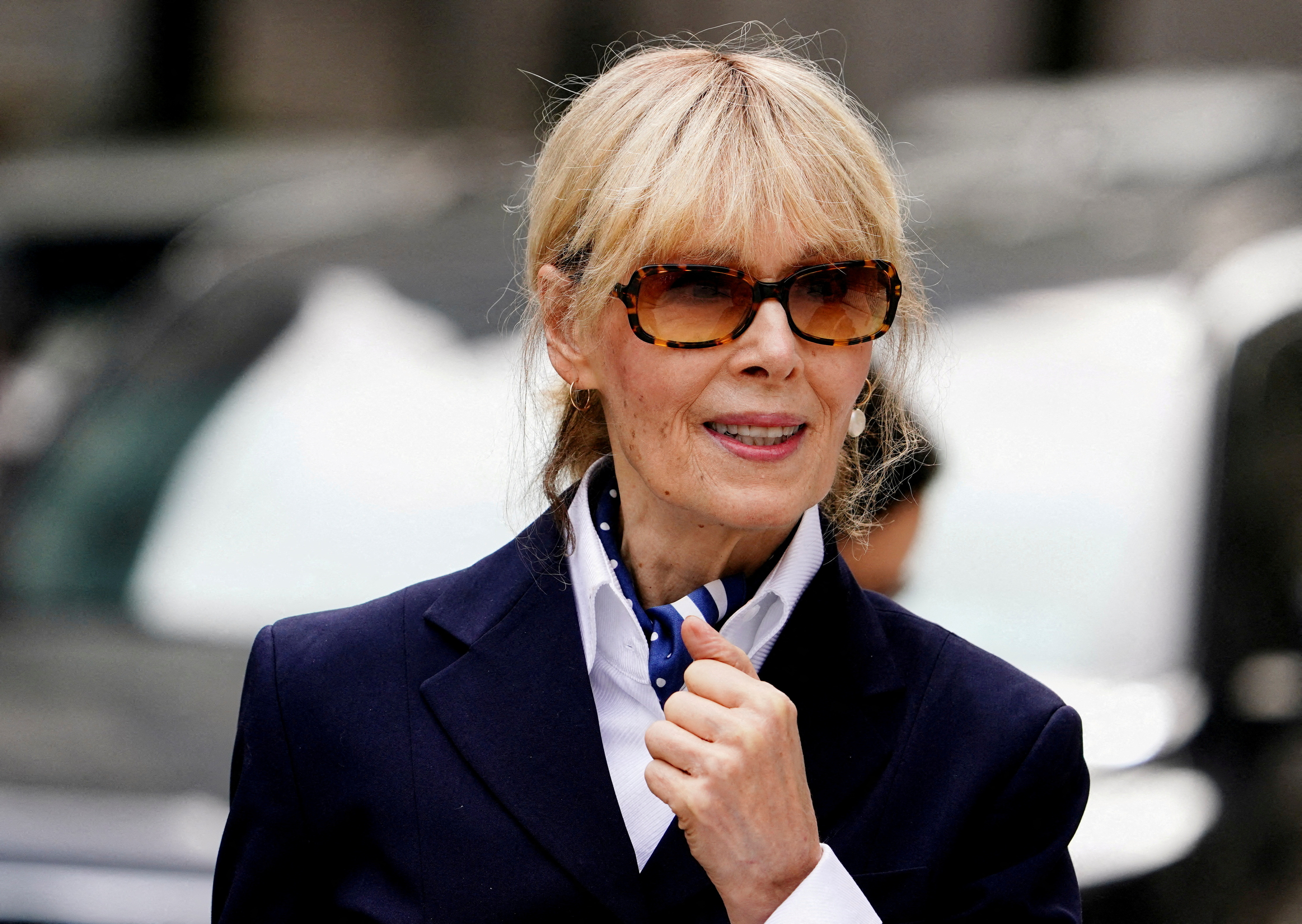 FILE PHOTO: Writer E. Jean Carroll leaves the 2nd U.S. Circuit Court of Appeals, where former U.S. President Donald Trump is asking a federal appeals court to overturn a $5 million jury verdict finding him liable for sexually assaulting and defaming her, who accused Trump of raping her nearly three decades ago, in Manhattan, New York, U.S., September 6, 2024. REUTERS/Adam Gray/File Photo