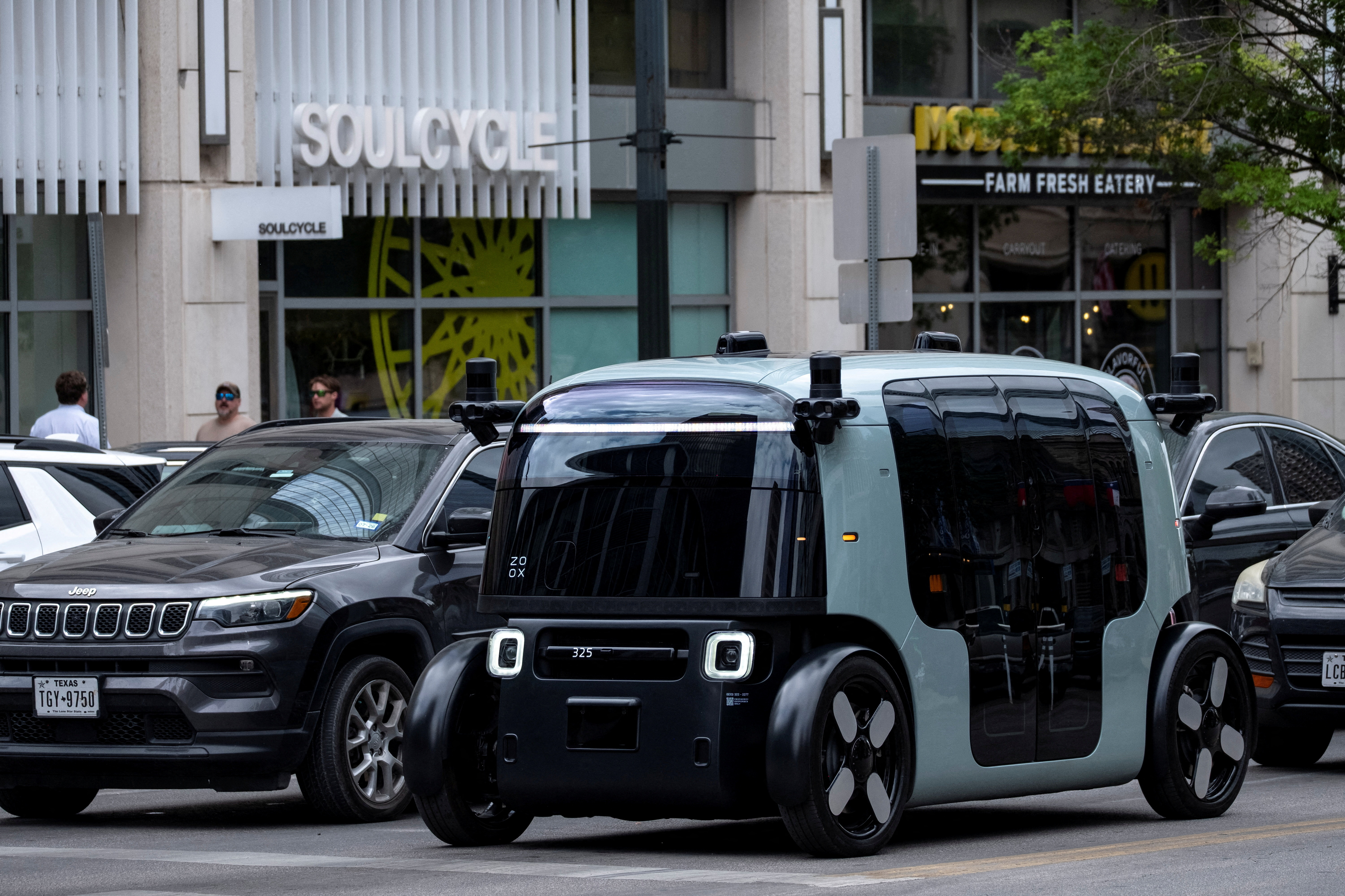 FILE PHOTO: A Zoox robotaxi operates on the streets of downtown Austin, Texas, U.S., March 31, 2026. REUTERS/Joel Angel Juarez/File Photo