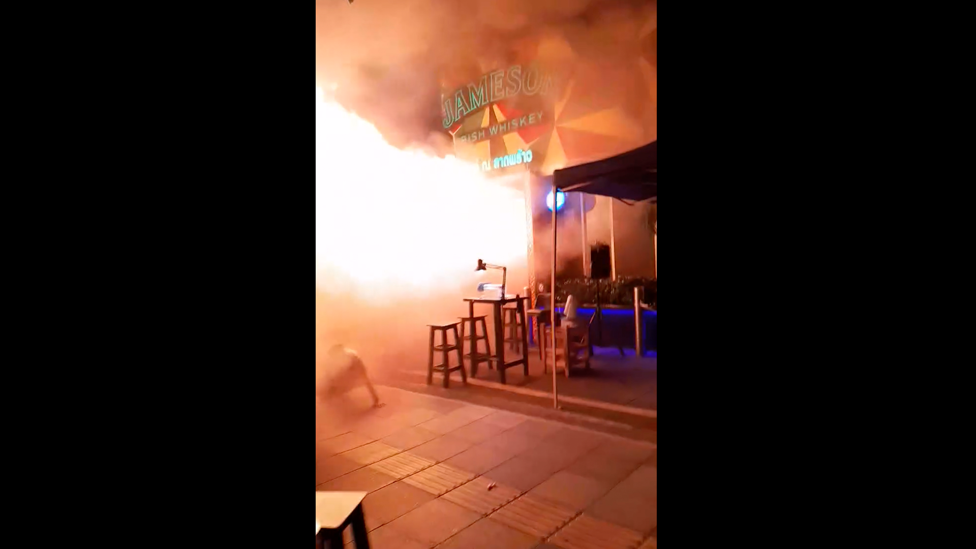 Fire engulfs popular Bangkok pub near Chatuchak market.