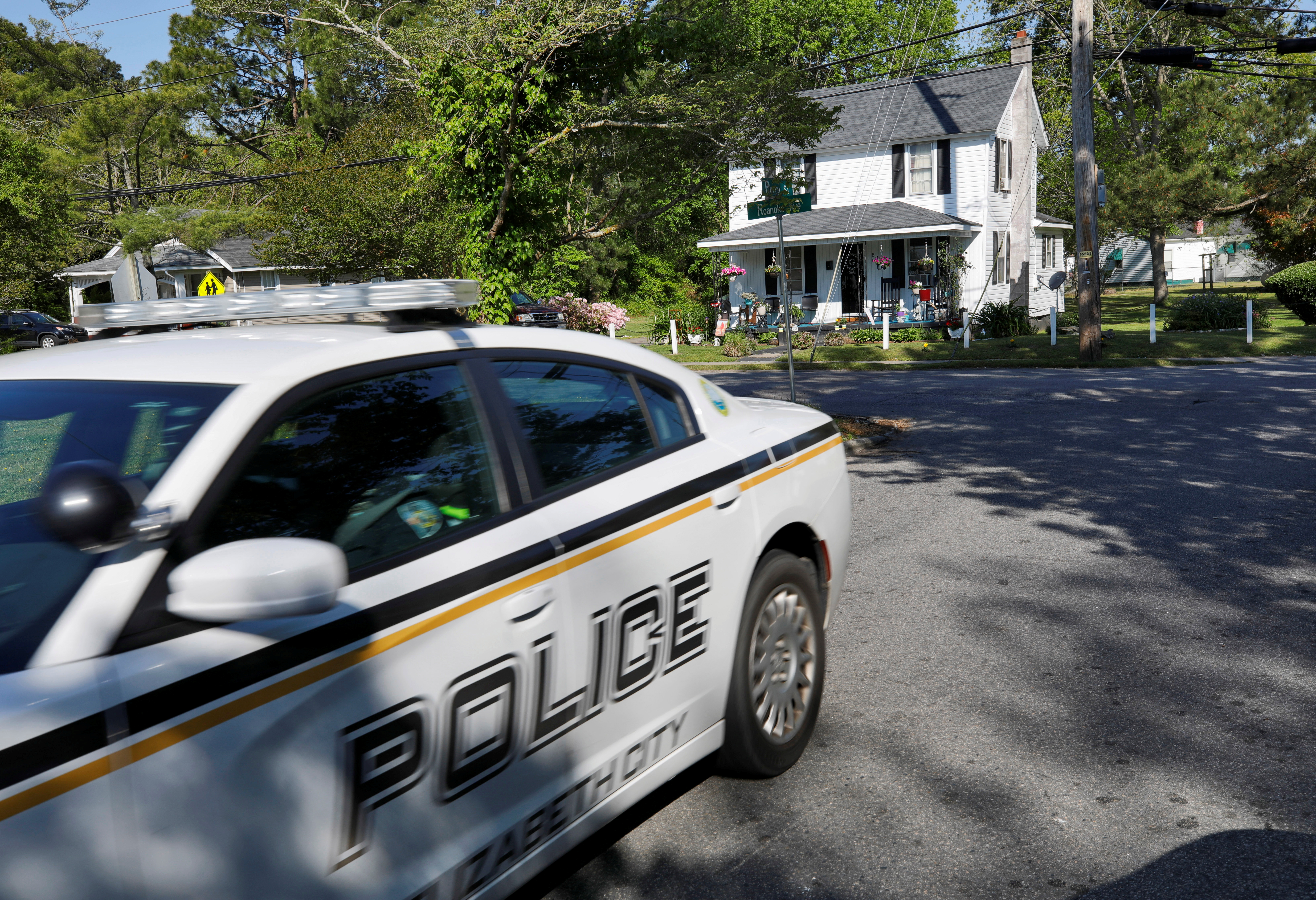 A city police car patrols the area where Black suspect Andrew Brown Jr. was killed by sheriffs last week, as family members demand more camera footage of the shooting in Elizabeth City, North Carolina, U.S., April 27, 2021. REUTERS/Jonathan Drake