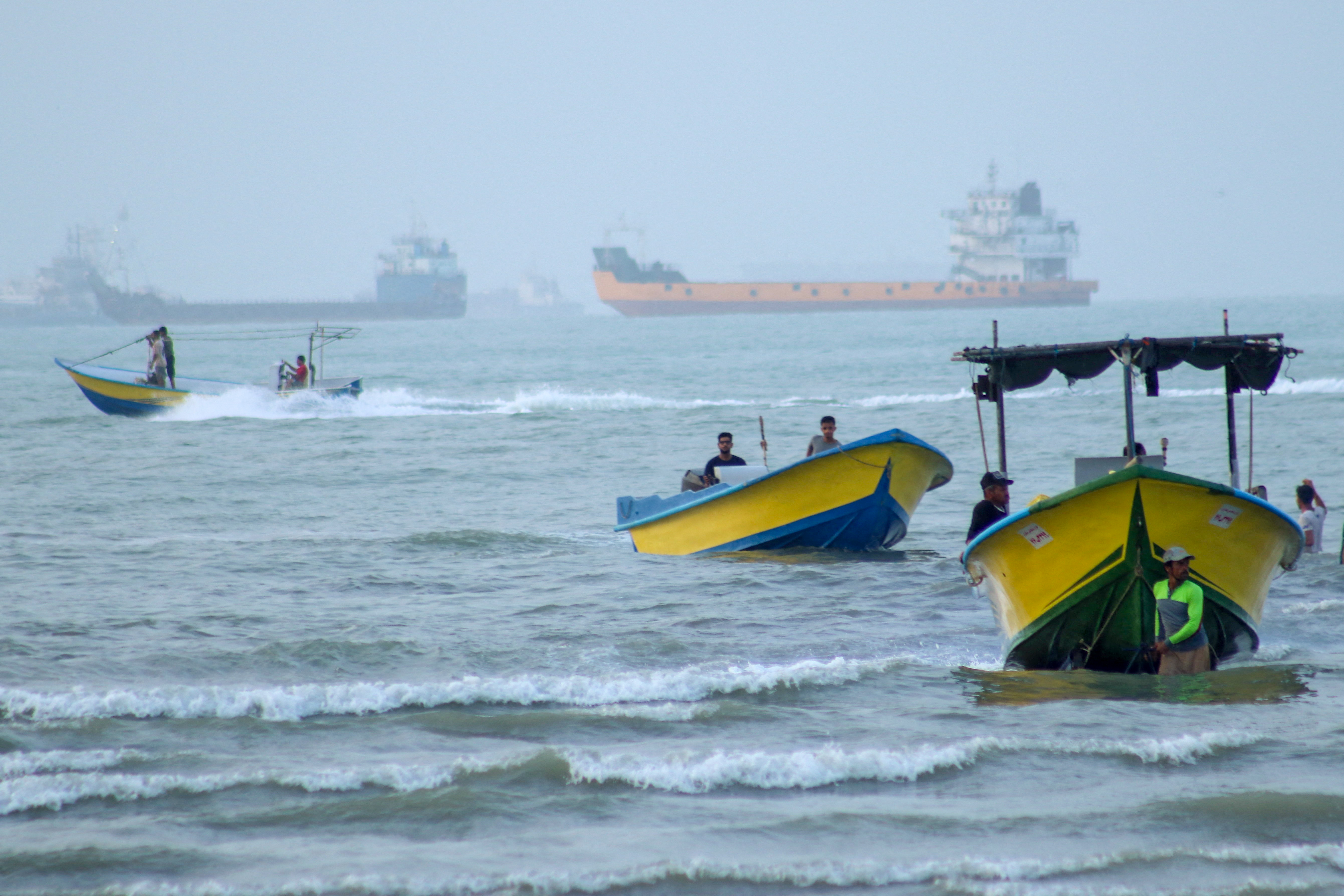 Vessels in the Strait of Hormuz near the beach of Bandar Abbas, Iran, July 27, 2026. Razieh Poudat/ISNA/via WANA (West Asia News Agency)via REUTERS ATTENTION EDITORS - THIS PICTURE WAS PROVIDED BY A THIRD PARTY. ATTENTION EDITORS - THIS PICTURE WAS PROVIDED BY A THIRD PARTY. ISRAEL OUT. NO COMMERCIAL OR EDITORIAL SALES IN ISRAEL. NO ACCESS FOR ISRAELI MEDIA. NO USE BBC PERSIAN. NO USE VOA PERSIAN. NO USE MANOTO. NO USE IRAN INTERNATIONAL. NO USE RADIO FARDA. DIGITAL: NO USE BBC PERSIAN. NO USE VOA PERSIAN. NO USE MANOTO. NO USE IRAN INTERNATIONAL. NO USE RADIO FARDA.