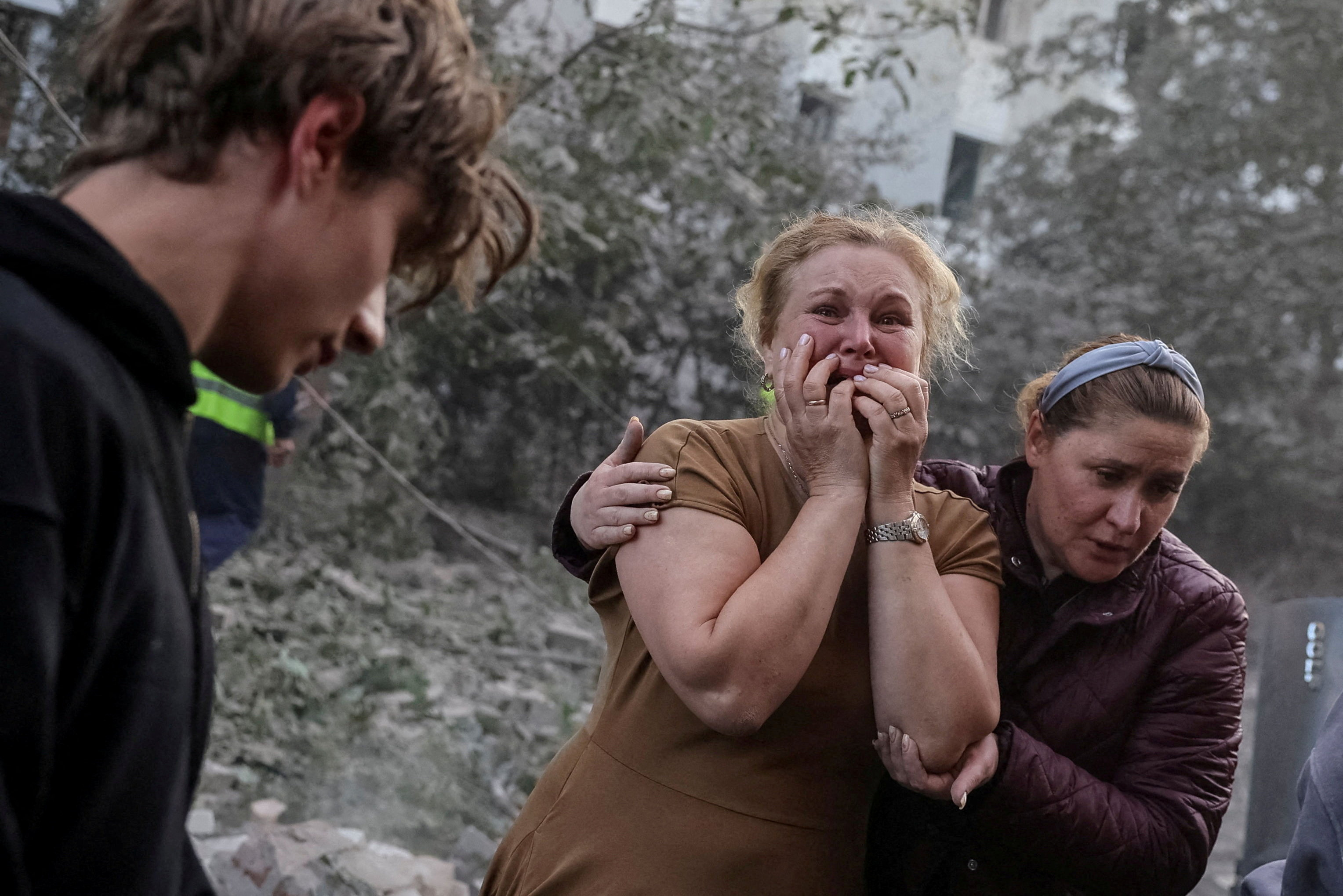 A woman reacts near an apartment building hit by a Russian missile strike, amid Russia's attack on Ukraine, in Lviv, Ukraine July 30, 2026. REUTERS/Roman Baluk TPX IMAGES OF THE DAY