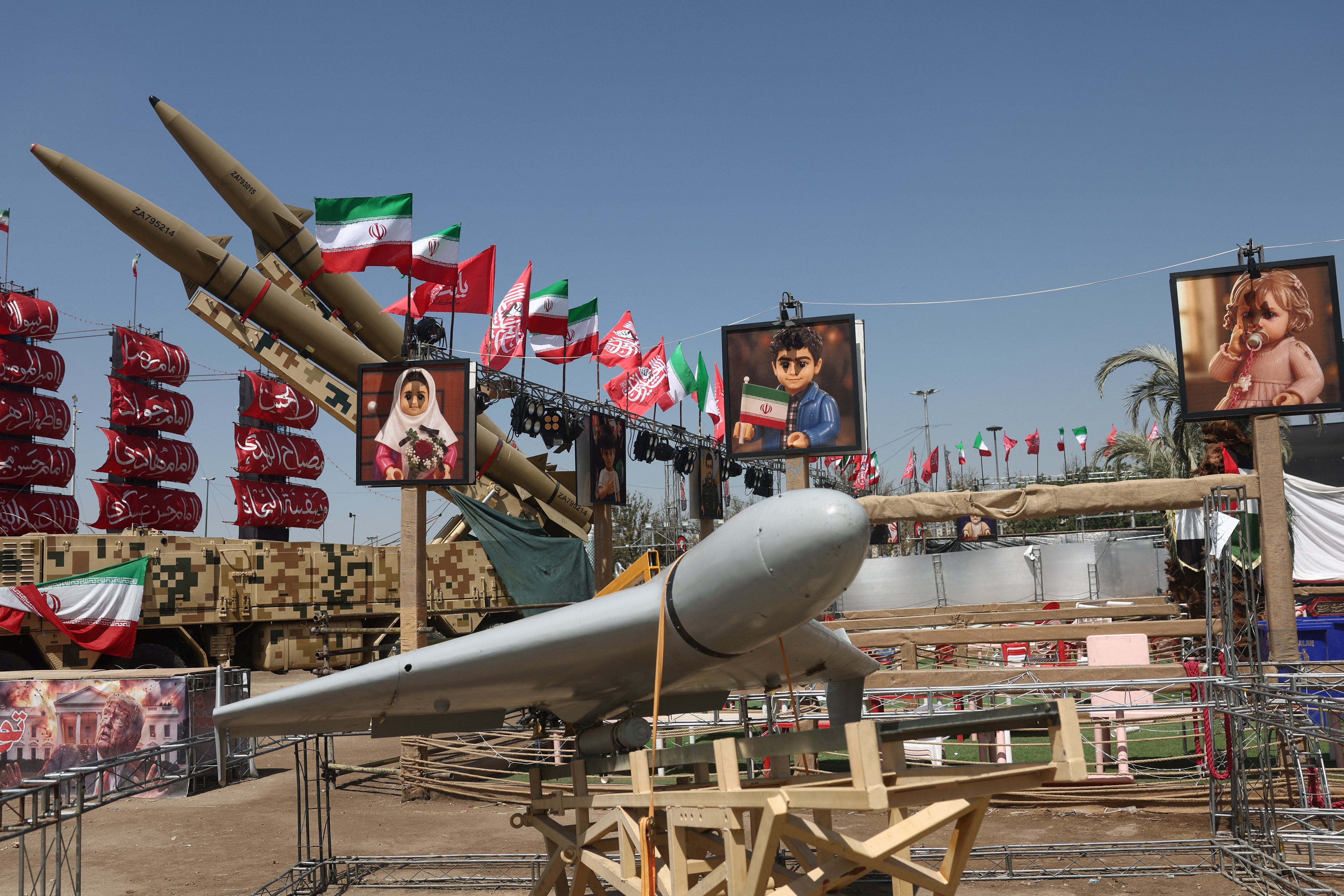 A drone and a missile system are displayed in a square.