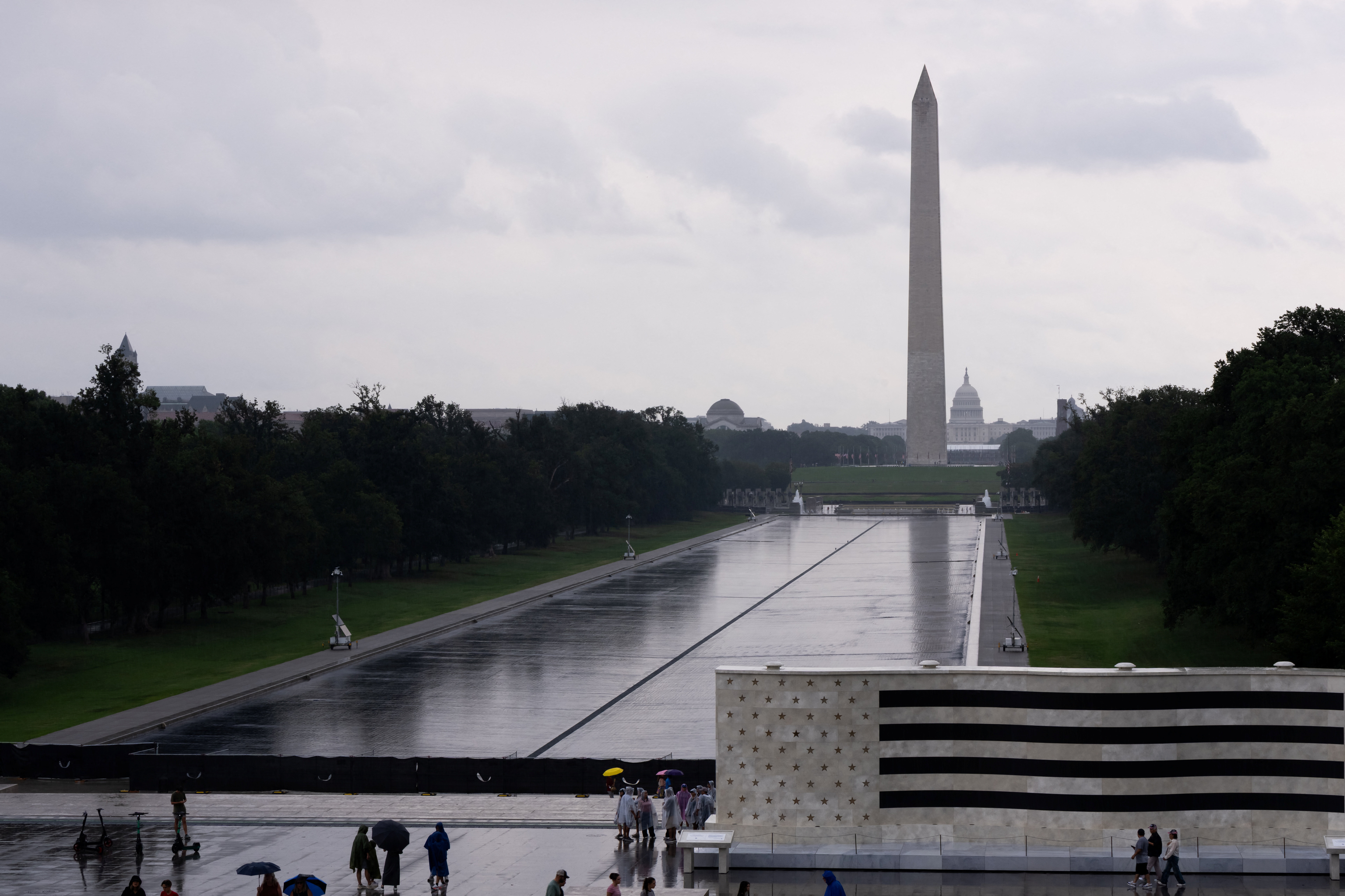 Rain falls on the now-drained Lincoln Memorial Reflecting Pool in Washington, DC, the US on August 2, 2026
