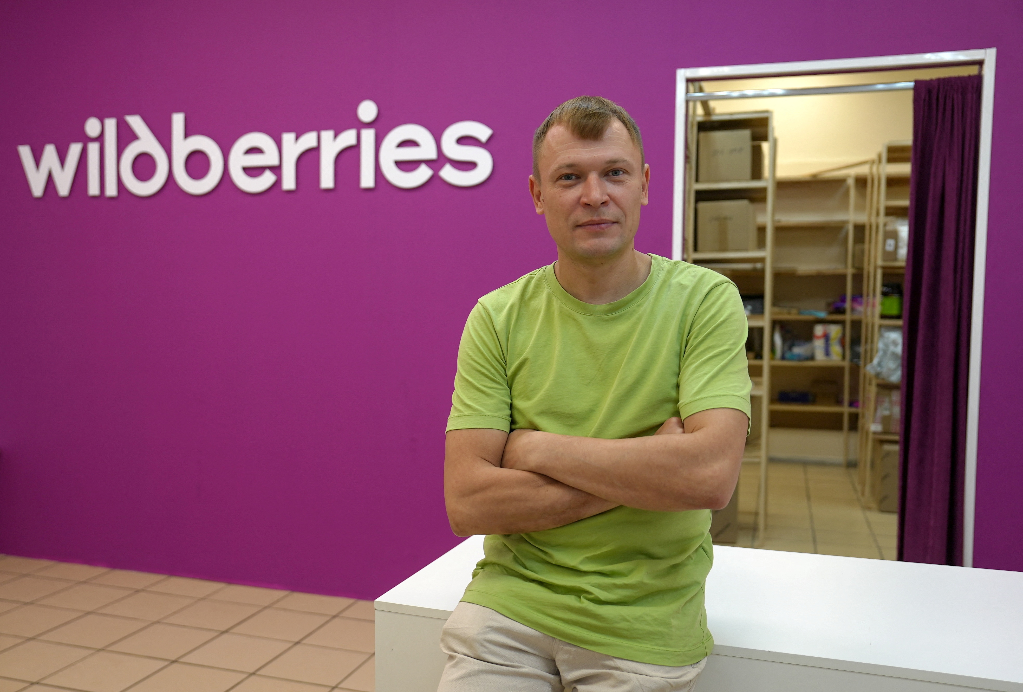 Businessman and owner of a Wildberries franchised pick-up point Vasily Klimov, who suffered financial losses following Ukrainian drone attacks on facilities of the Russian e-commerce giant during the Russia-Ukraine conflict, poses for a picture in Moscow, Russia, August 4, 2026. REUTERS/Lev Sergeev