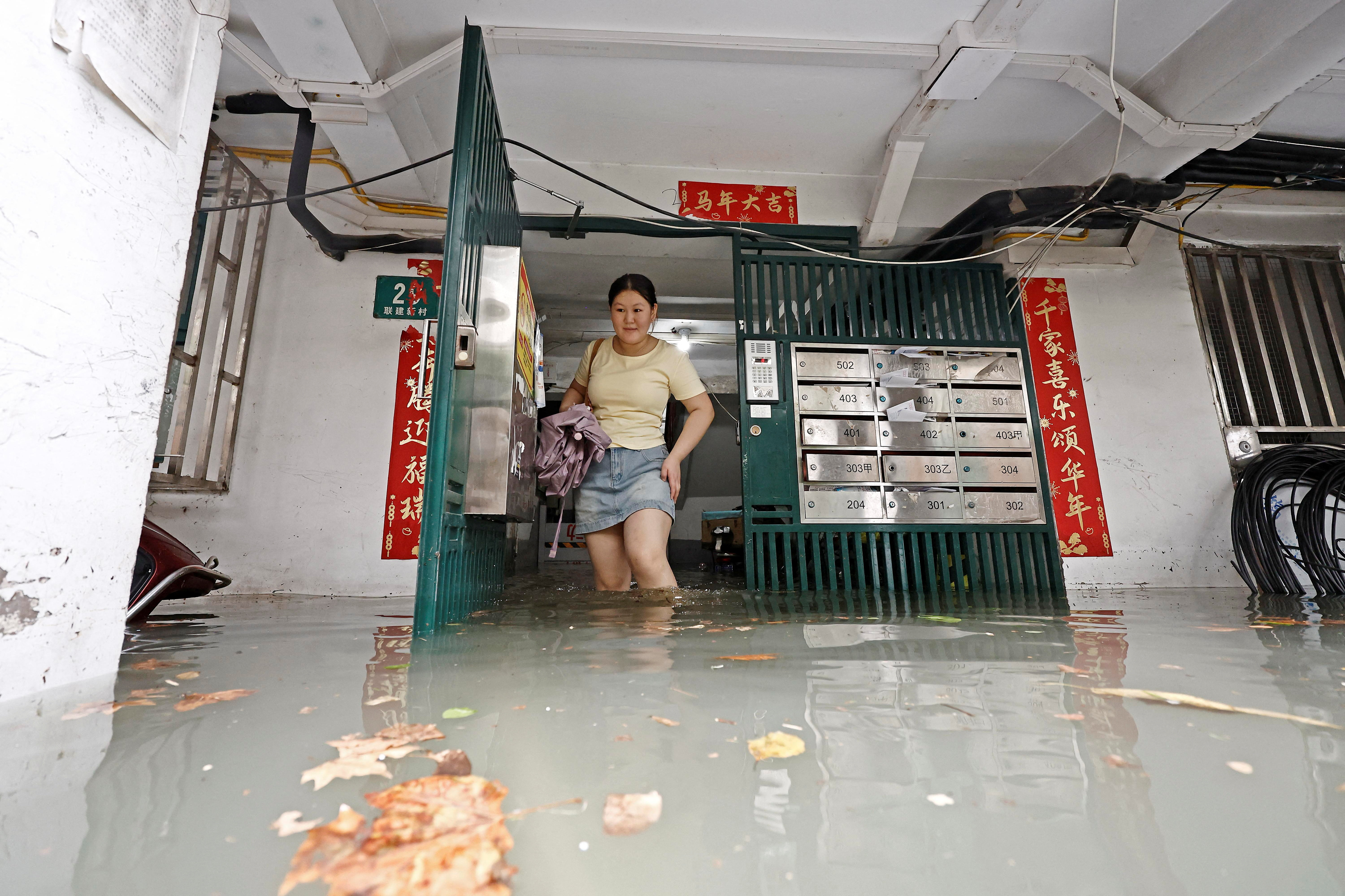 Powerful Typhoon Dolphin hits China, sparking flood and landslide warnings