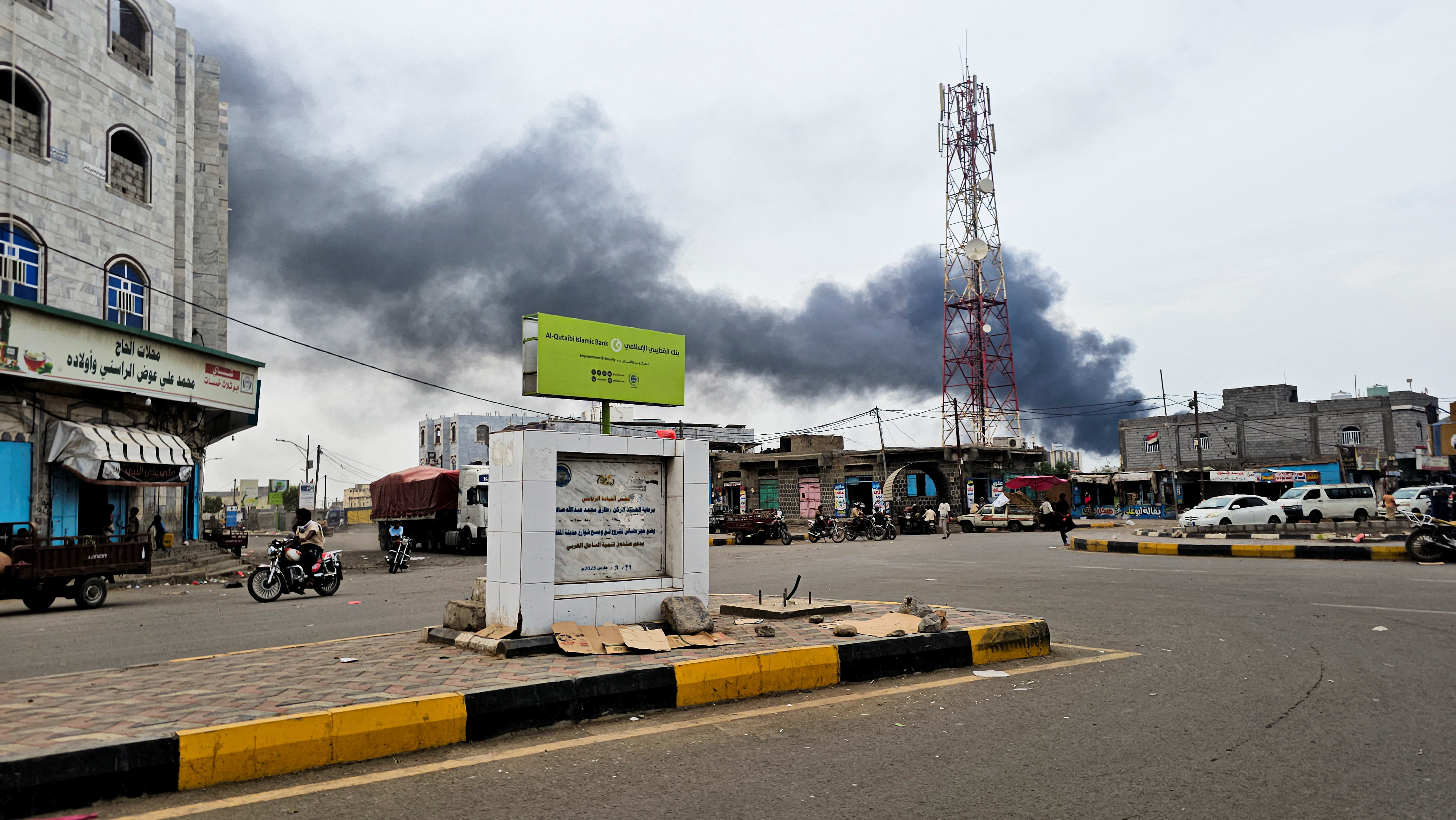 Smoke rises during Houthi missile and drone strikes on the Red Sea port city of Mocha