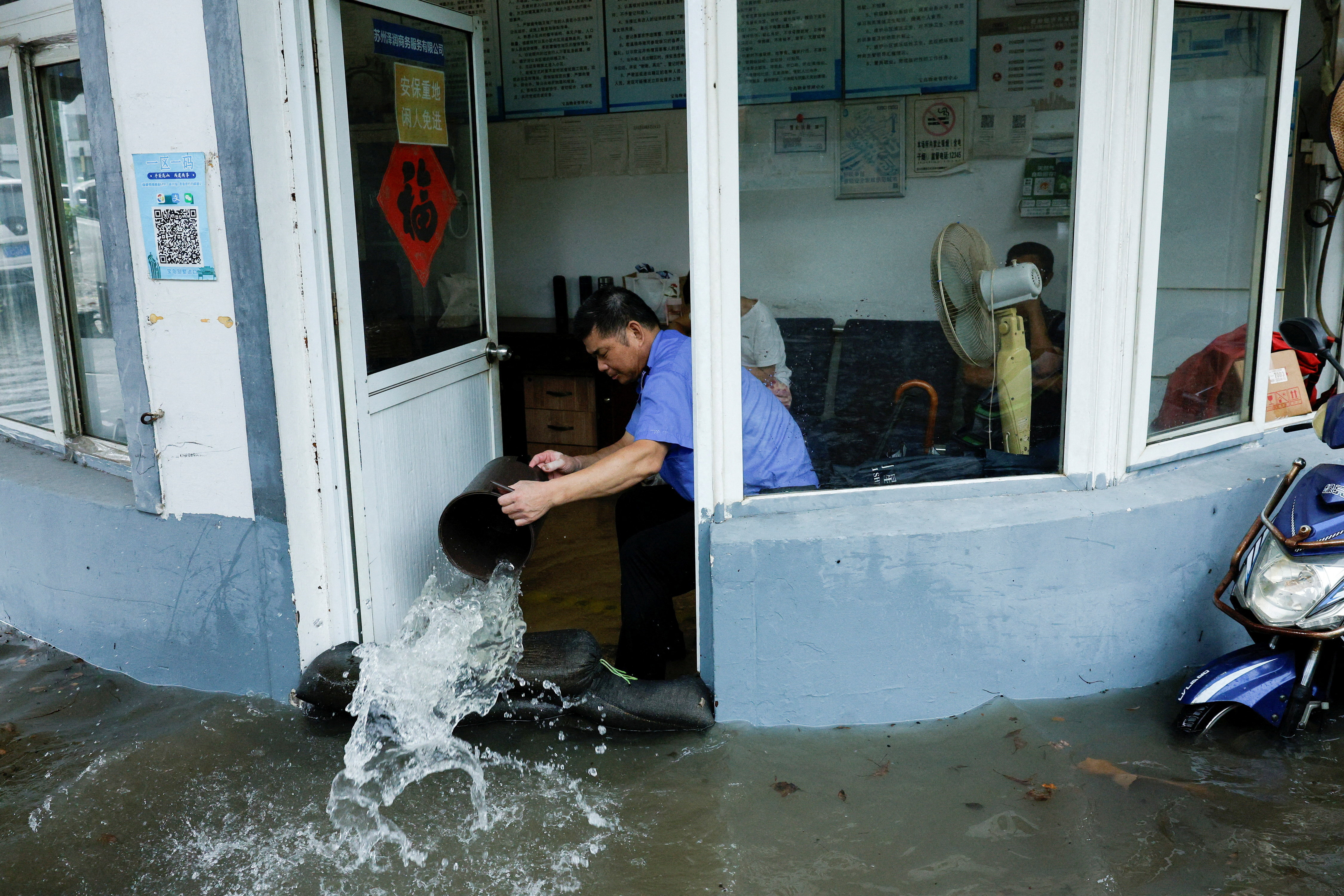 Powerful Typhoon Dolphin hits China, sparking flood and landslide warnings