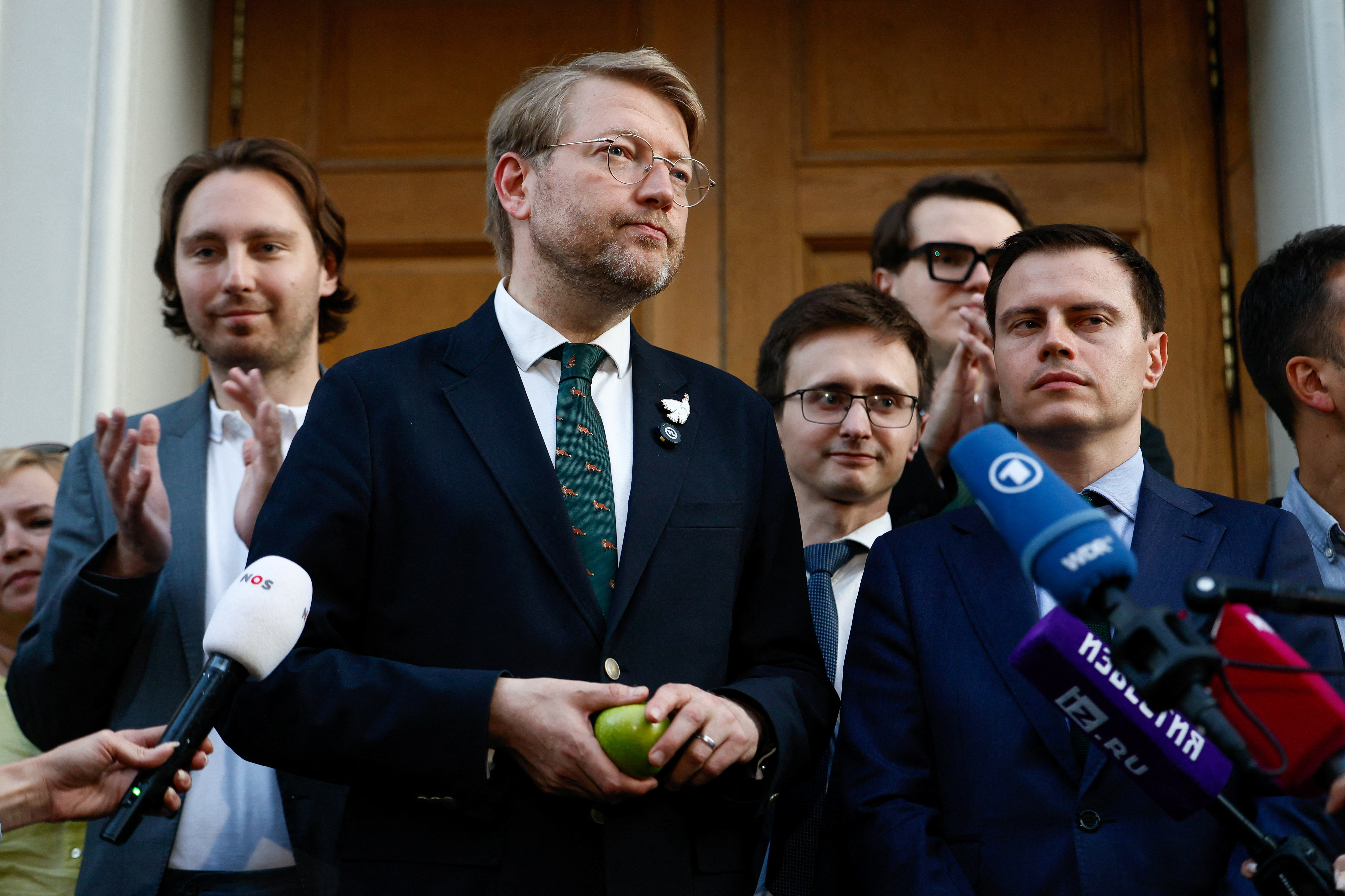 Chairman of Russia's Yabloko political party Nikolai Rybakov meets with journalists and supporters after a Supreme Court hearing in Moscow, Russia on August 10, 2026.