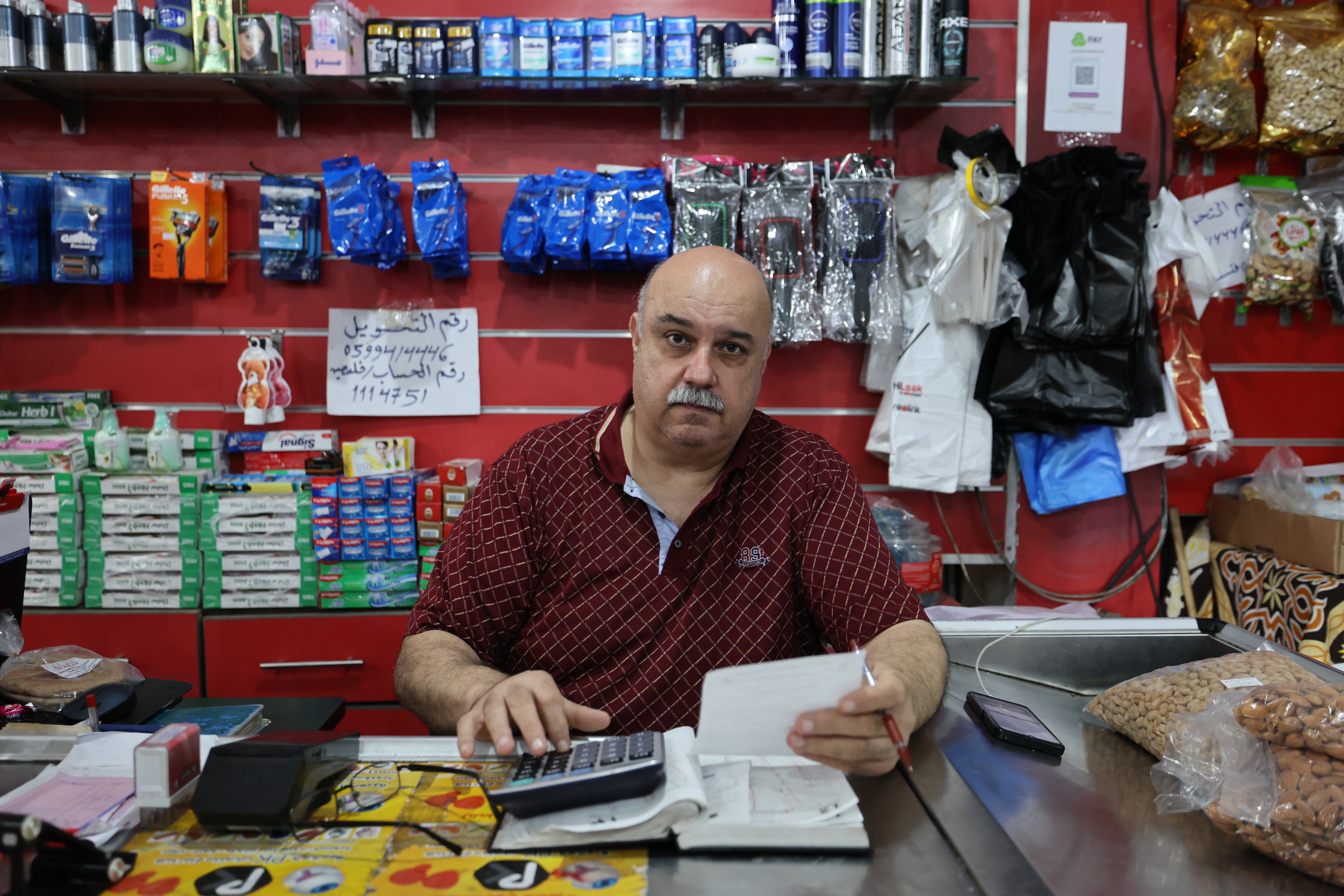 Maher Al-Khudari says that a lot of customers in Gaza try to buy goods with credit