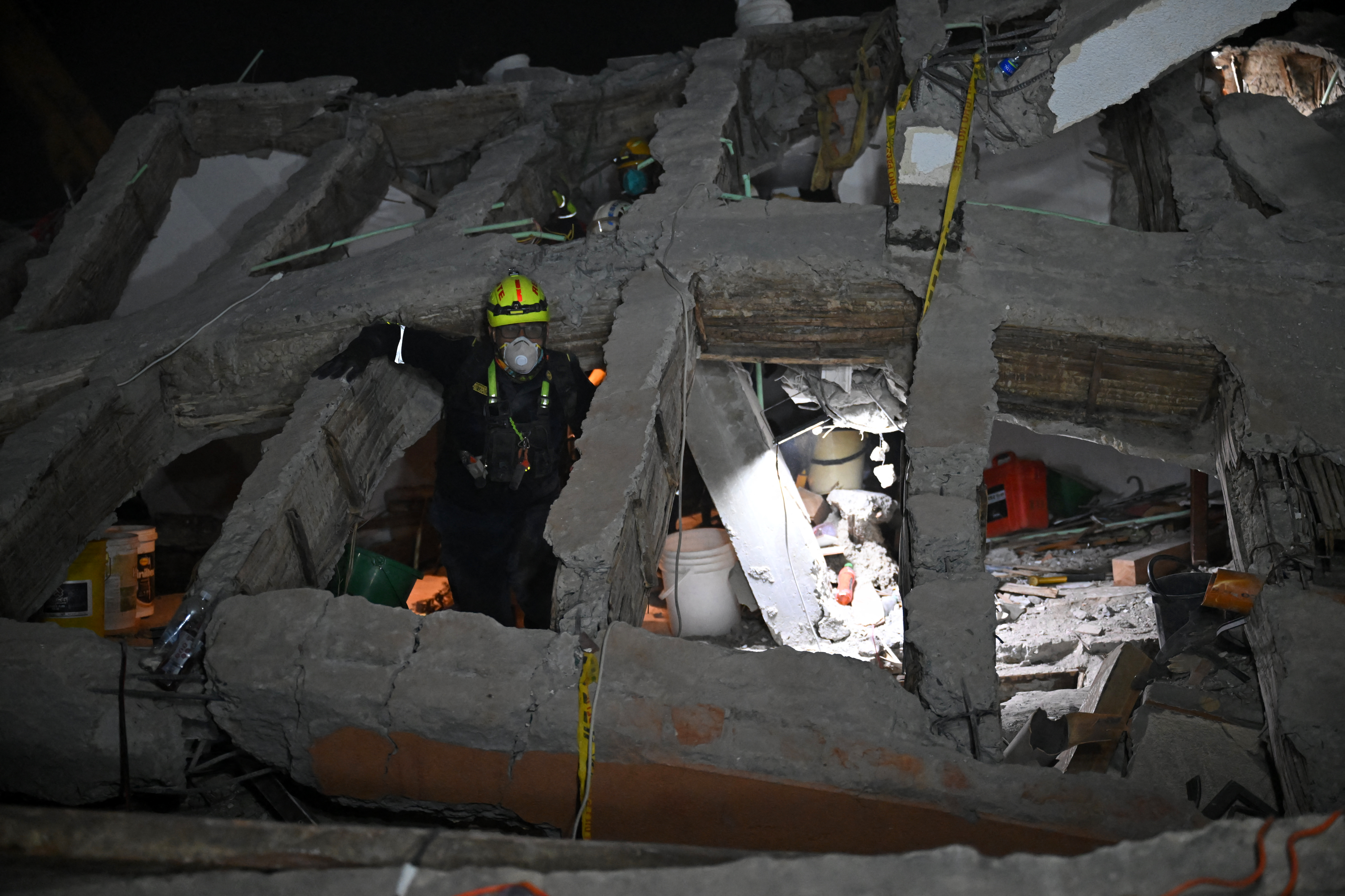 Hope fades as teams dig for survivors in Colombia earthquake