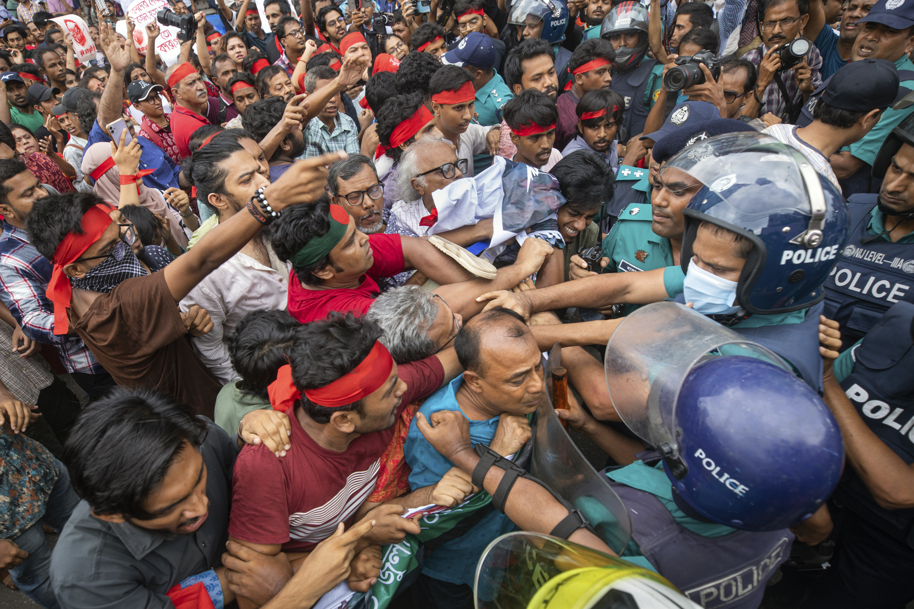 Activists clash with the police during a march in Dhaka, Bangladesh, on Tuesday, July 30, 2024